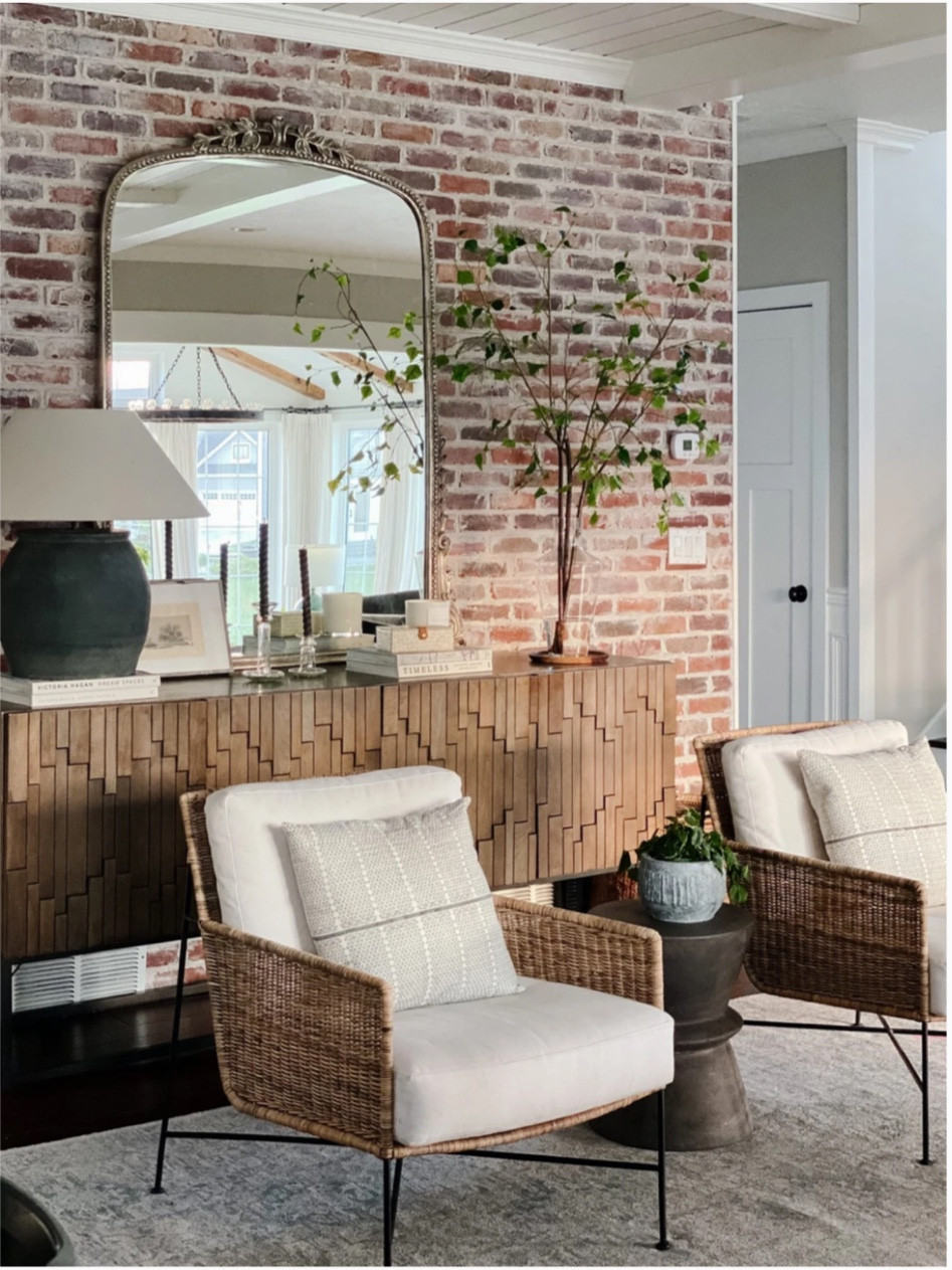 Wool rug on sale at Serena & Lily. High end, well made rug. Anthropologie mirror. Vintage mirror look alike. Living room furniture. Family room furniture. Rattan lounge chair. 

#LTKHome #LTKFamily #LTKSaleAlert