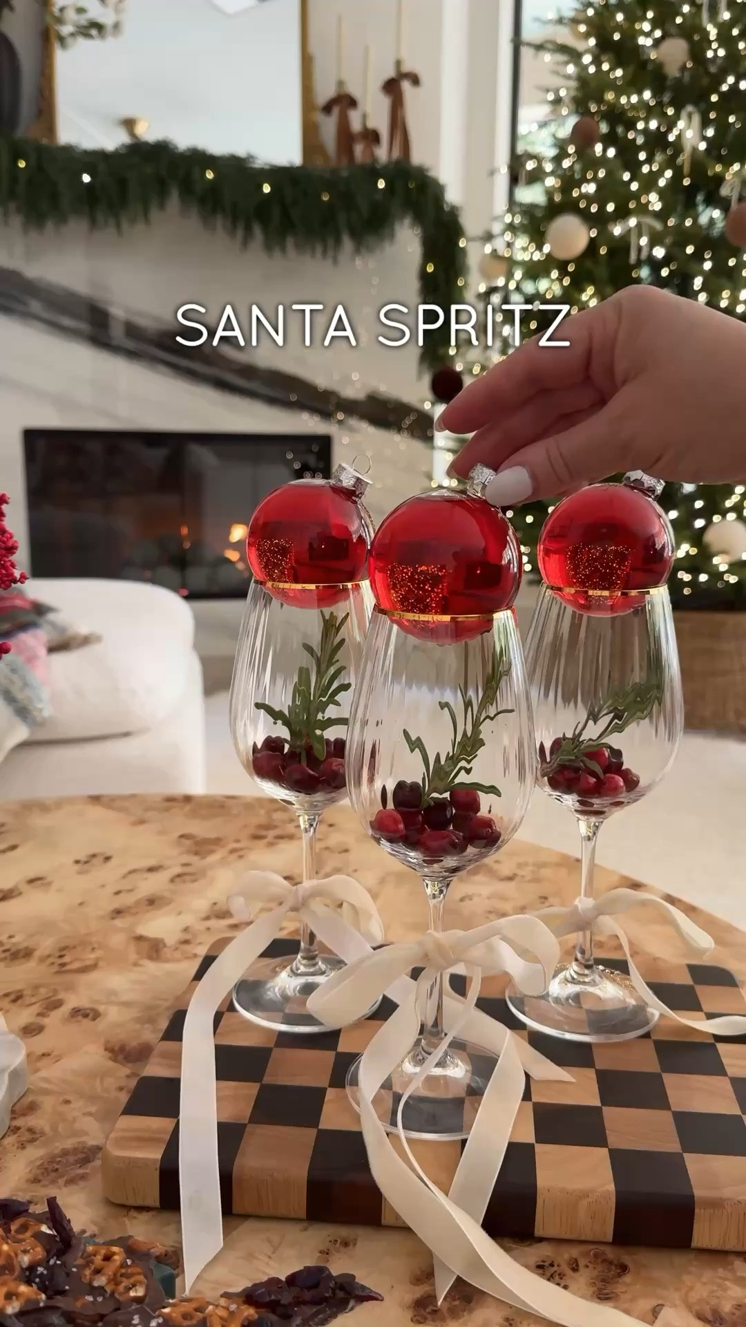 Santa Spritz 
* Ocean Spray® Cranberry Juice
* 1oz Prosecco
* 1oz Cranberry Lime Seltzer
* 1 Sprig Rosemary
* Fresh Cranberries

1. Add ice, prosecco & seltzer in a glass.
2. Garnish with rosemary sprig & cranberries.
3. Fill ornament until almost full with Ocean Spray® Cranberry Juice.
4. Cap off or simply place ornaments in ice or in the fridge to chill.
5. When ready to serve, pour the ornament into the cocktail.