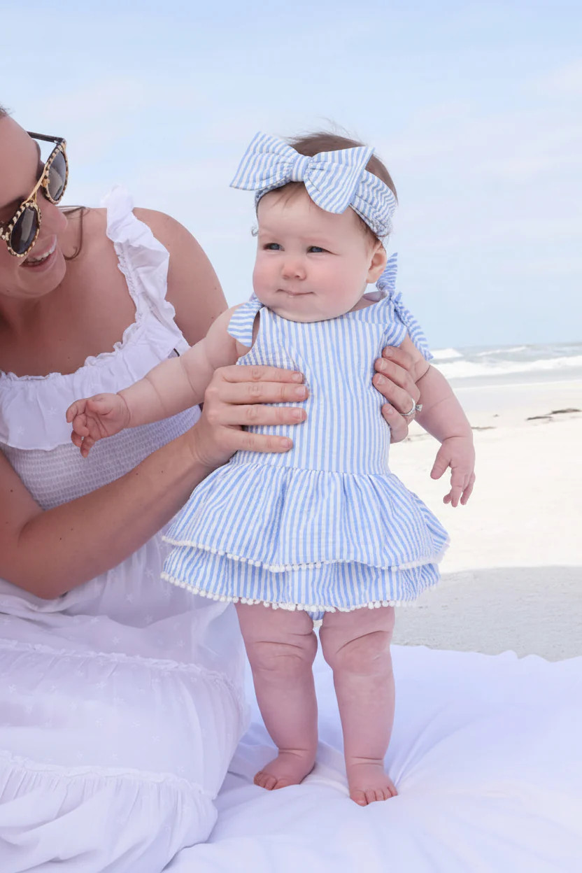 Tiered Skirt with White Pom Trim | Seersucker Blue | Caden Lane