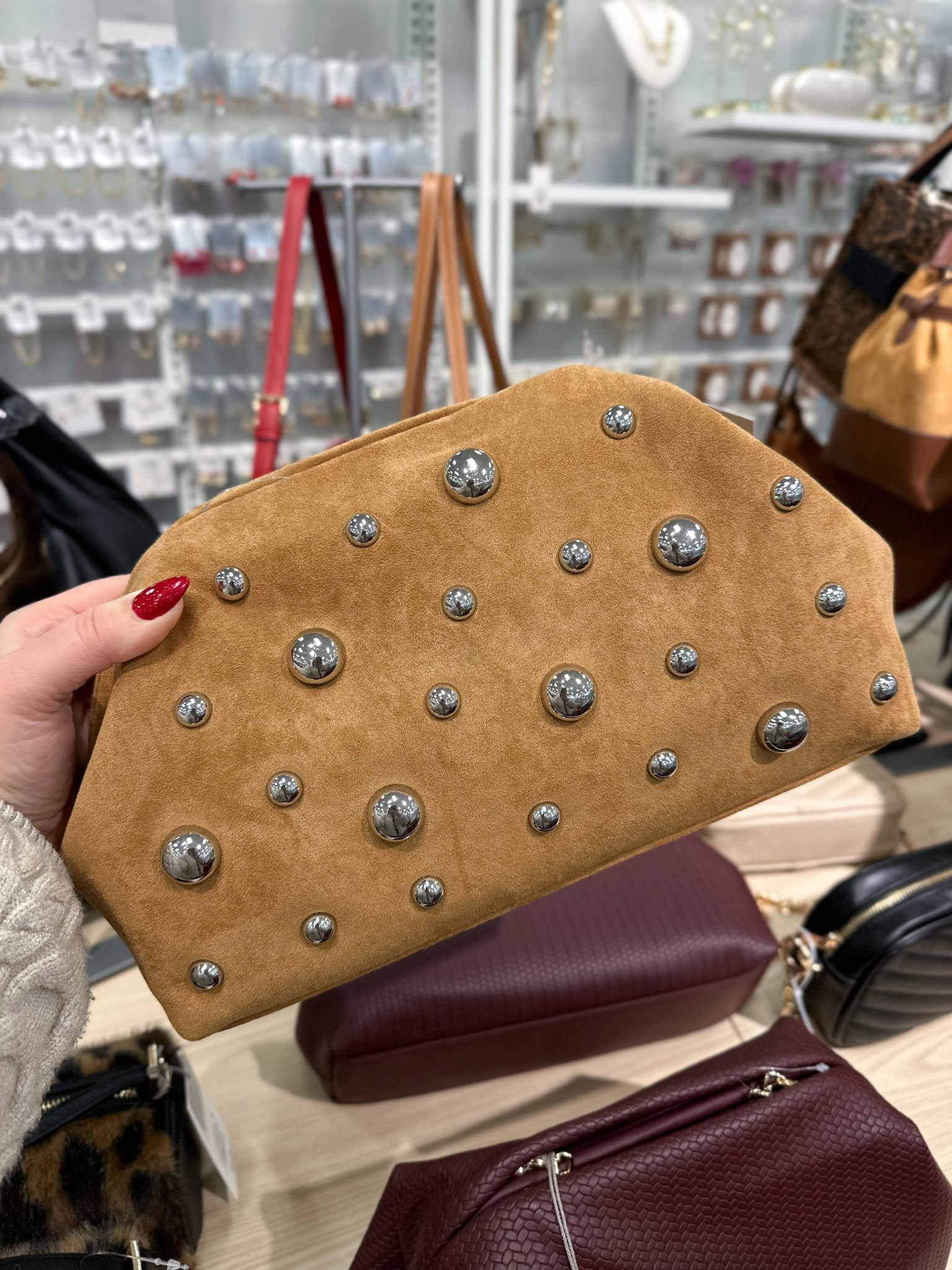 OBSESSED with this faux suede studded clutch!! Looks designer for only $30. 

#LTKFindsUnder50 #LTKSeasonal #LTKootd
