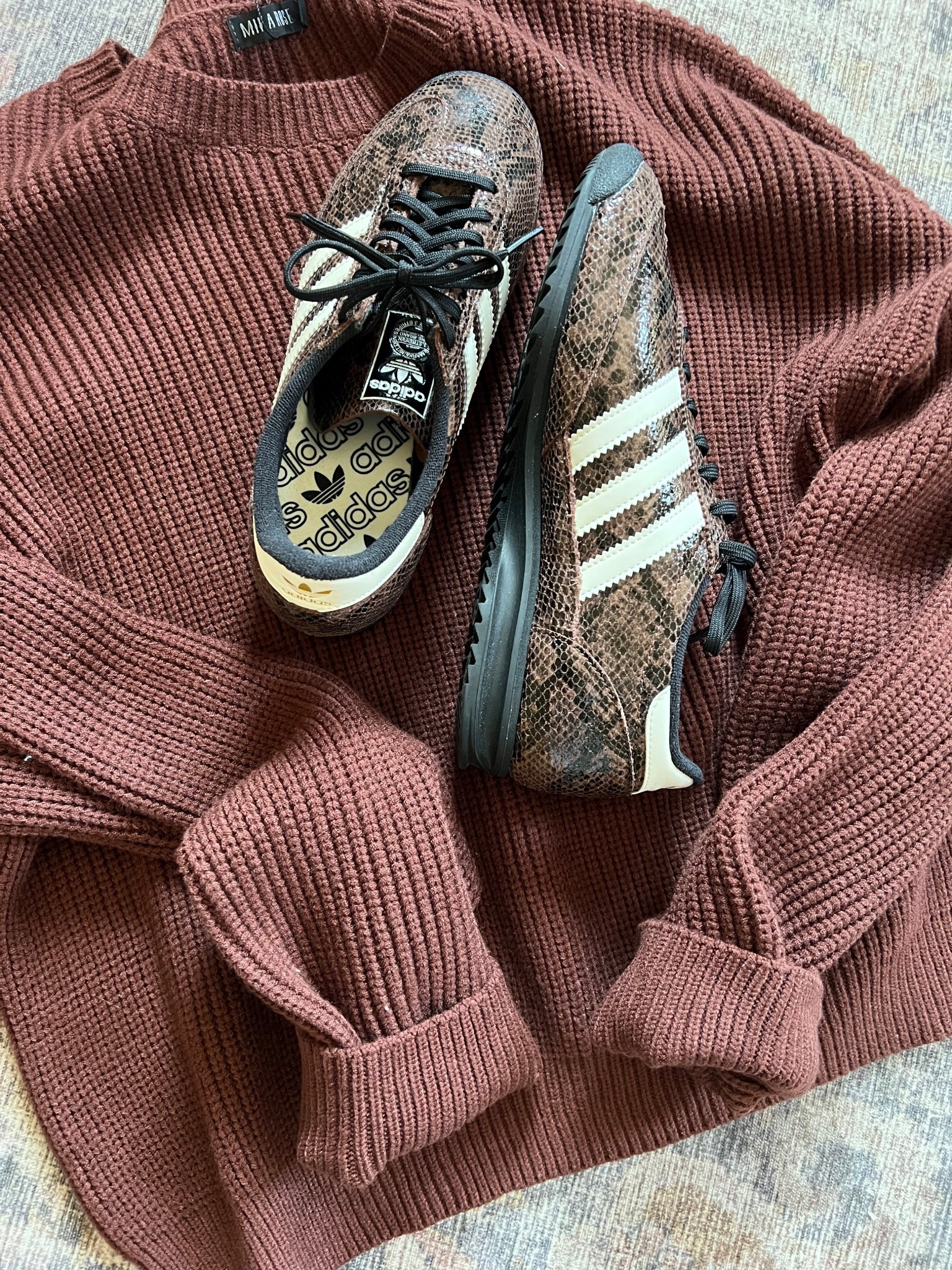New Fall Sneakers!! Adidas SL 72 OG sneakers with the chicest snakeskin detail. They’re lightweight, easy to clean, and the perfect pairing with sweats OR  jeans. A subtle nod to the 70s with a modern twist.

Shop them before they sell out! Sizing info: I’m typically an 8.5 or 9 and the 8.5 fit perfect. Size down if you’re in between sizes. 

#LTKStyleTip #LTKShoeCrush #LTKFindsUnder100
