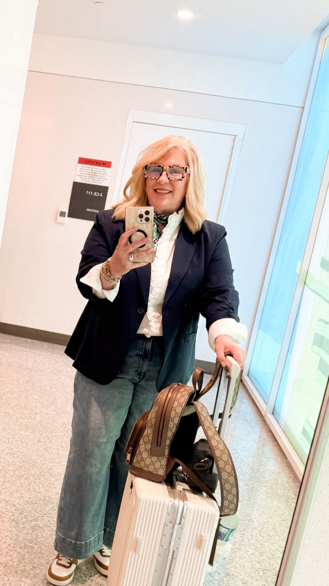 Travel day!! I never travel without my Gucci backpack. It’s an investment buy so so worth it!!!  Scarf is vintage YSL and Nikes are available in brown -shows white but all differebt cor options  

#LTKOver40 #LTKTravel #LTKootd