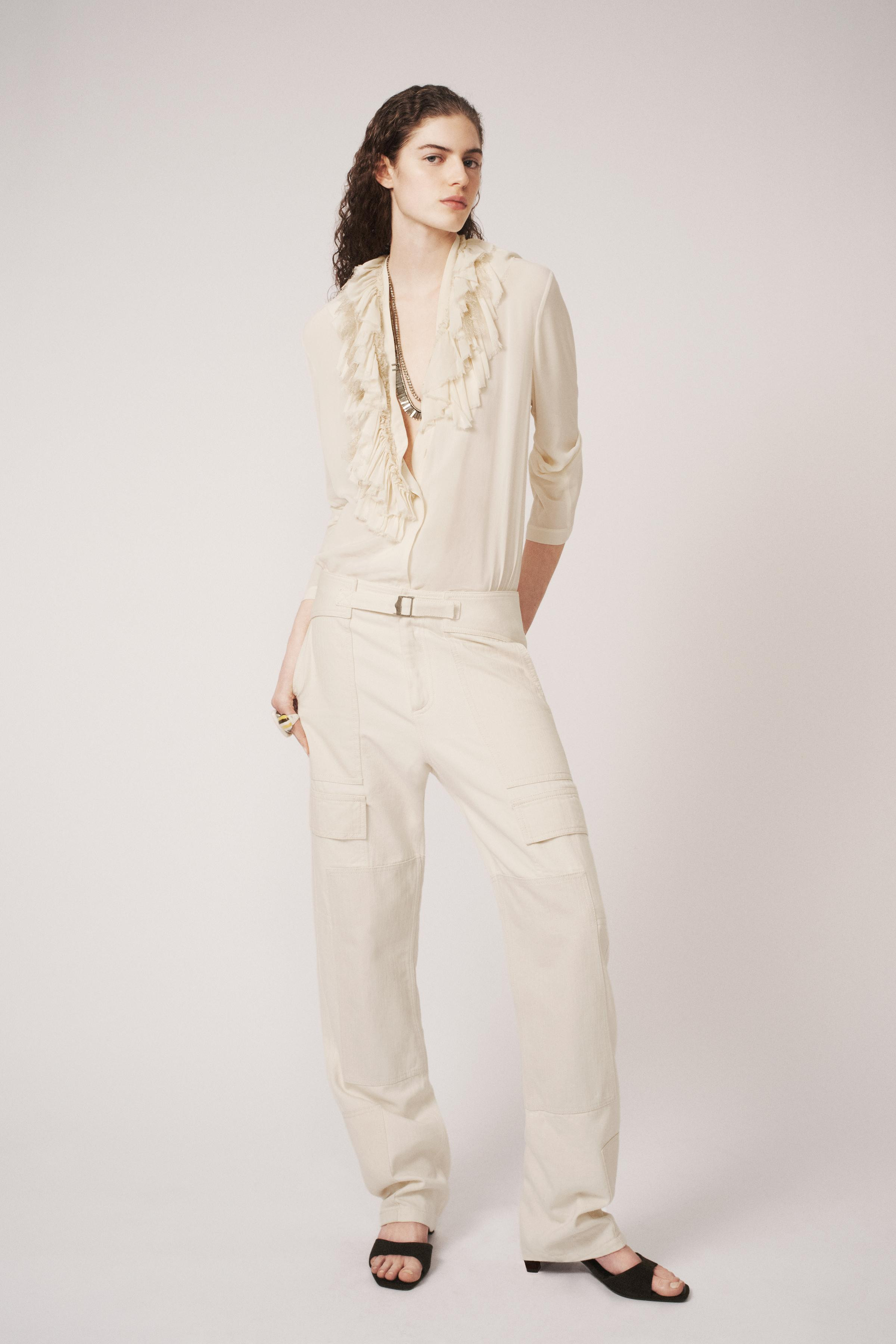 ZARA WOMAN COLLECTIONMid-waist trousers with main fabric made from cotton yarn. Adjustable waist ... | Zara IT