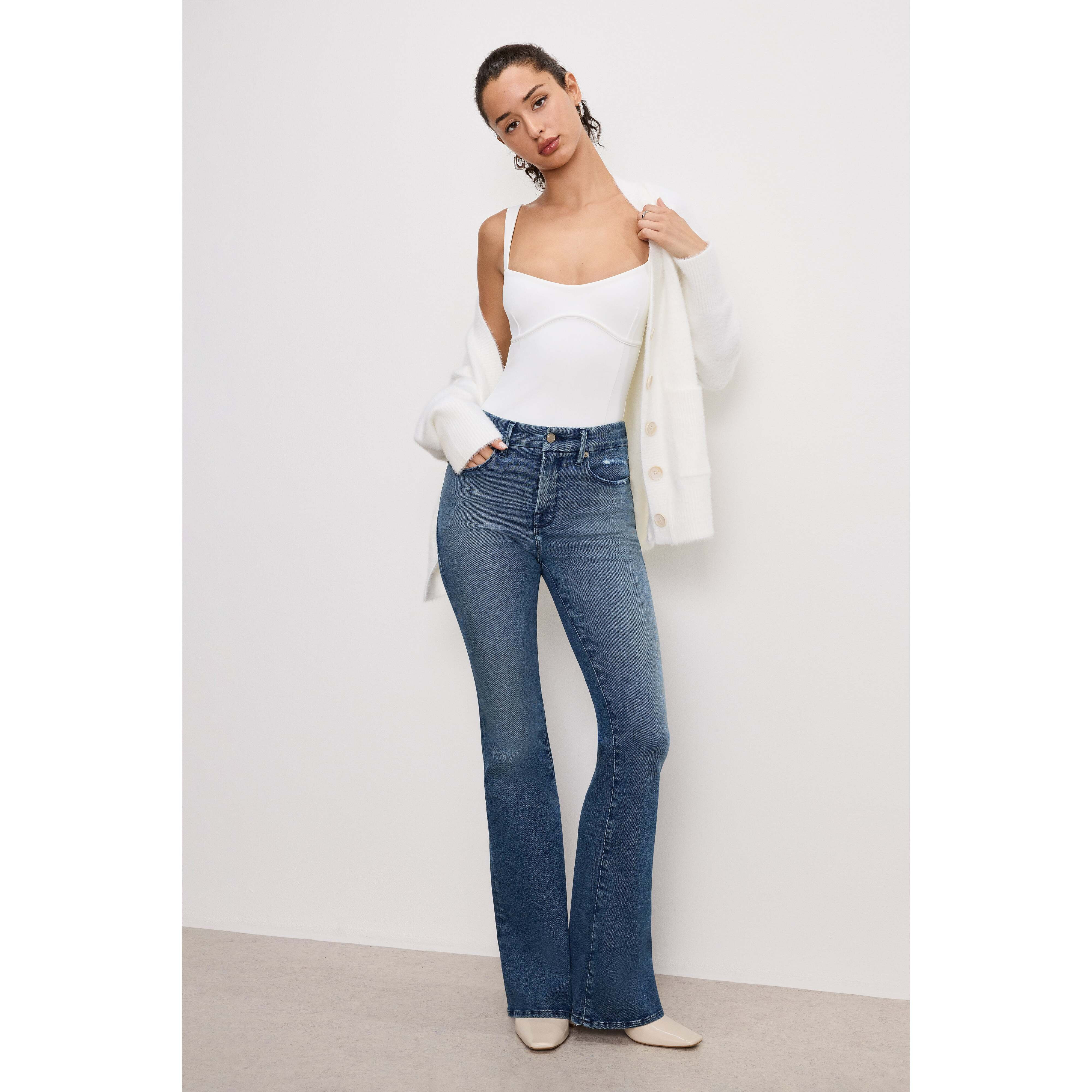 Women's Good Legs Flare Jeans | Extra Stretch, Flat Tummy Tech, Gap-Proof Waistband | Indigo, Size 0 | Good American by KhloÃ© K | Good American