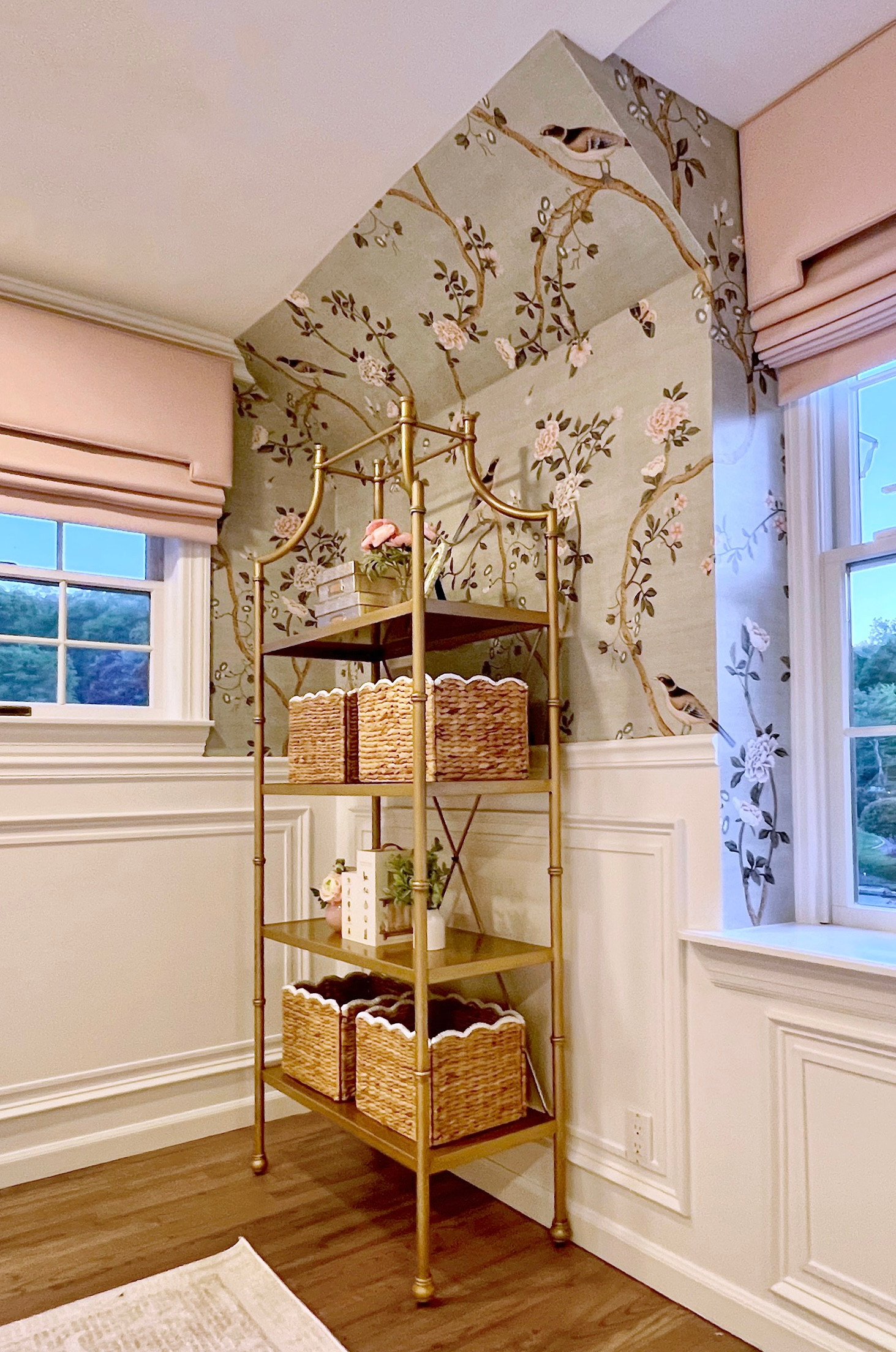 You can never have enough nursery storage! For this Virtual Design client's nursery, we included a gold etagere. Etageres are great because they take up less "visual" space, and can easily be anchored to the wall.

In versions like this that have glass shelves, I always recommend swapping out the shelves for acrylic which is much safer. 

How gorgeous does this look against the custom wainscoting paneling and the chinoiserie wallpaper? The full nursery design is coming soon!

Design by Little Crown Interiors 

 #LTKHome #LTKBaby #LTKBump