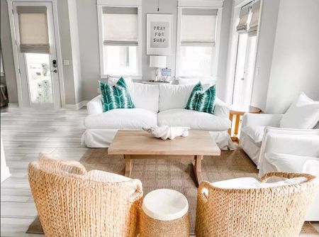 The perfect coastal living room. My favorite couch and seagrass gliders from grandinroad

#LTKhome #LTKstyletip