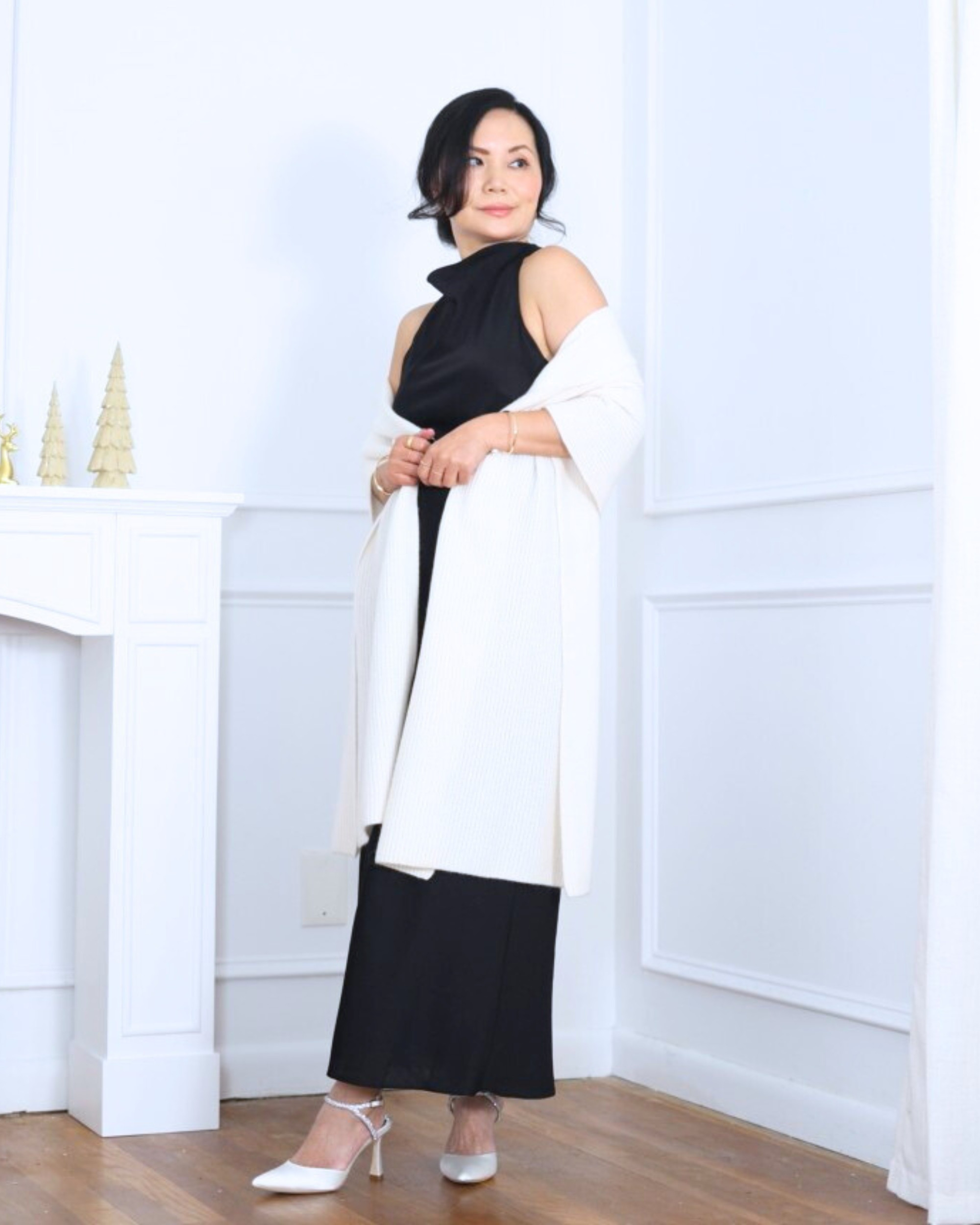 A chic high-neck silk black dress paired with a cozy cashmere wrap from Quince—simple, elegant, and timeless for any special night. I’m 5’2, wearing size XS.

#LTKHoliday #LTKOver40 #LTKPetite