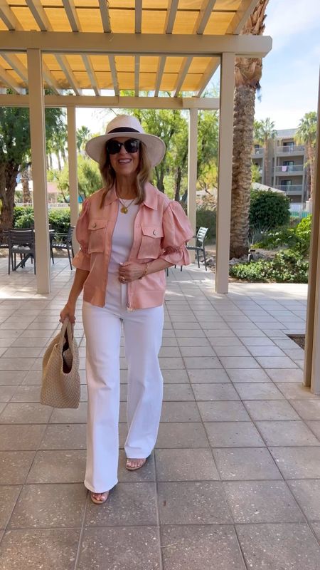I'm enjoying an afternoon in Palm Desert! Wear this top alone or over a tank, t-shirt, or slip dress. It runs tts.  The jeans fit well and feel nice. They run big!  I brought one tote to carry to the pool or shopping. The sandals are an excellent style to wear with jeans or dresses. 