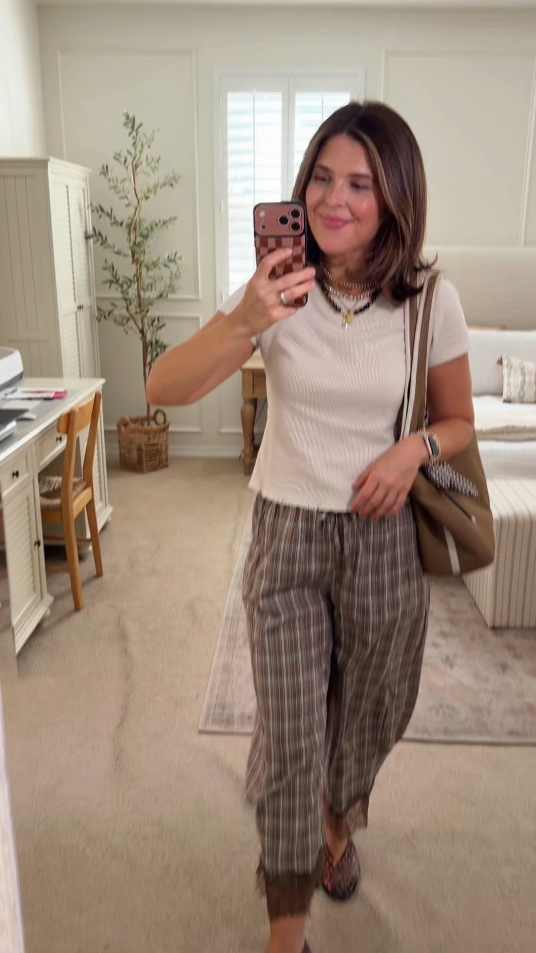 These plaid lace-trim wide-leg pants from Amazon might be the most versatile piece in my closet right now! Styled here 6 different ways. Linking the pants plus every top and bag shown so you can recreate any (or all) of these looks.

#LTKgrwm #LTKootd #LTKSeasonal