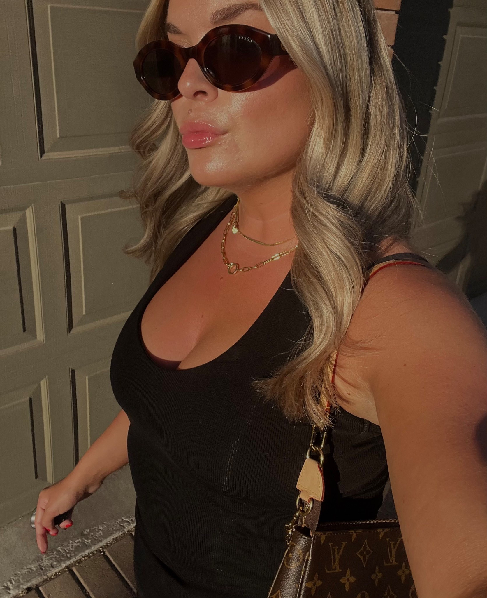 Black halter top 
Gucci oval sunglasses
Designer sunglasses
Black skirt 
Revolve outfits