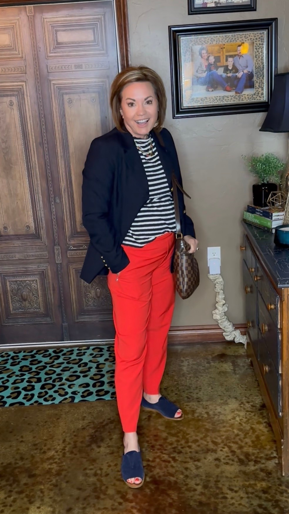 Serving bold + classic with this easy, elevated look. These red ankle pants are the statement piece, paired with a timeless striped tee and a structured navy blazer for that polished, pulled-together vibe. Finished with comfy slide sandals and a classic crossbody—because style should never sacrifice comfort.

red ankle pants outfit, red pants outfit women, how to style red pants, bold color outfit ideas, business casual outfit women, casual workwear outfits, chic everyday outfit, over 40 fashion blogger, over 50 style inspiration, classic style outfits, navy blazer outfit women, striped shirt outfit ideas, French style outfit women, effortless chic outfit, polished casual look, comfortable stylish outfits, everyday outfit inspiration, spring outfit ideas women, summer work outfits women, casual chic outfits women, mom style outfit ideas, real life fashion inspiration, wearable fashion trends, classic wardrobe staples outfit, capsule wardrobe outfit idea, elevated basics outfit, teacher outfit ideas, business casual teacher outfit, comfortable work outfit women, stylish mom outfits, casual Friday outfit women, weekend outfit ideas casual chic, easy outfit formula women, timeless outfit ideas, minimal effort outfits women, flattering outfit ideas women, ankle pants styling ideas, slide sandals outfit women, crossbody bag outfit styling, mix and match outfit ideas

#LTKmomlife #LTKOver40 #LTKMidsize