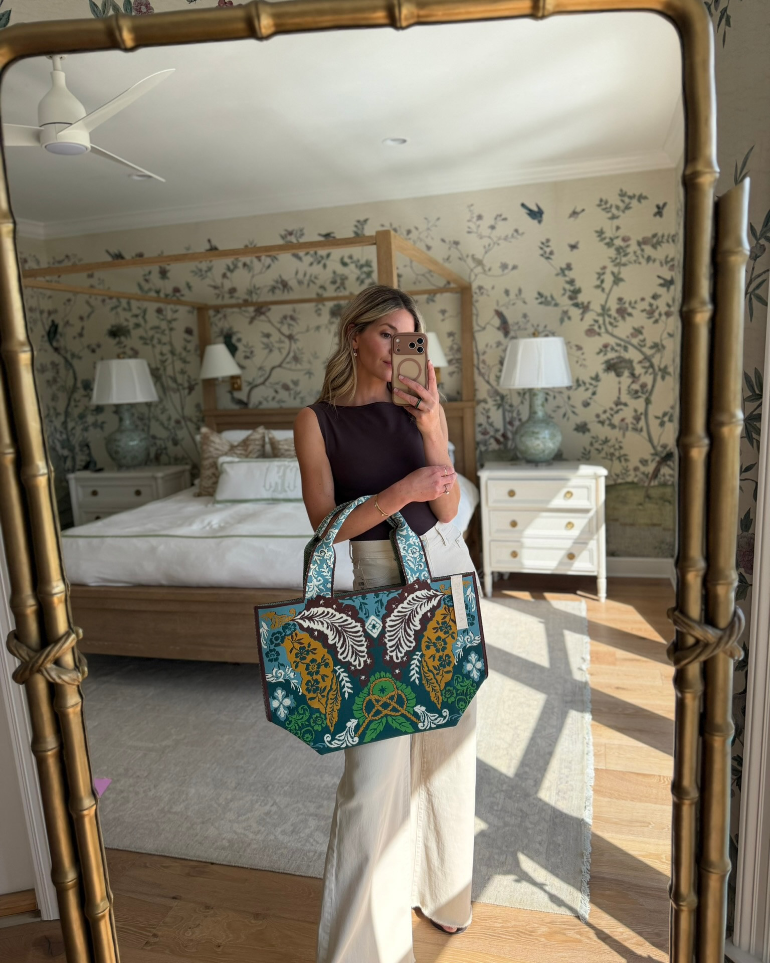 this tote is SO fun and such an easy way to add color + print to a simple outfit! i love it paired with this chocolate top and ecru wide leg jeans because the bag really gets to be the statement.

the top is such a good elevated basic for fall, and the ecru denim keeps everything feeling light while still transitioning into the season. such an easy outfit formula for lunch, errands, or a casual dinner, with the tote doing all the extra work.

#LTKSeasonal #LTKootd