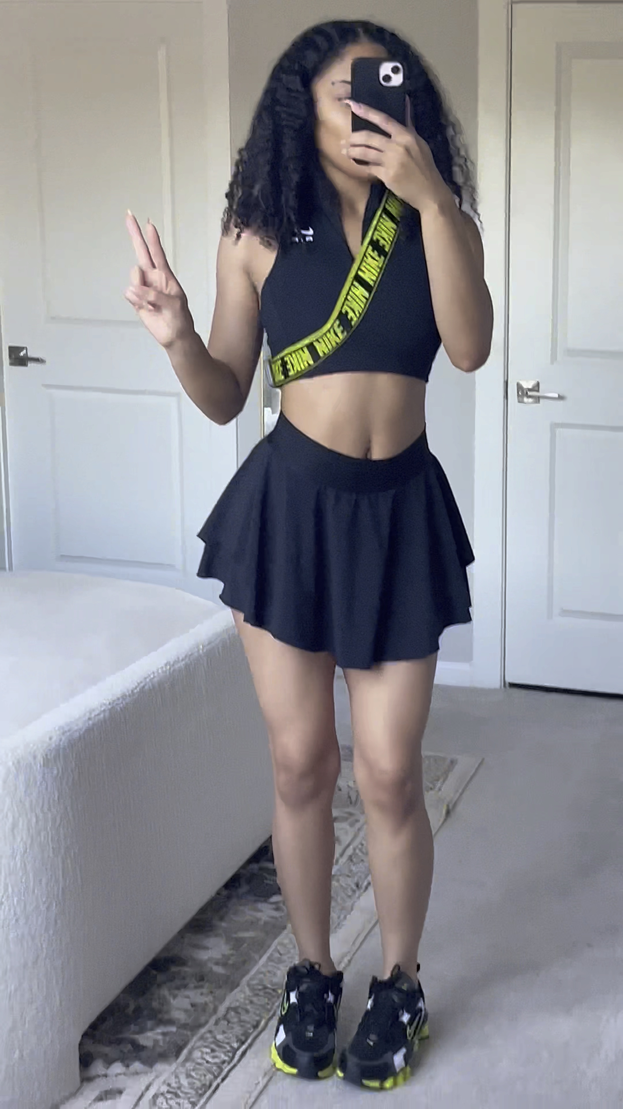 So cute and comfy for working out 🖤

Top: Small
Skirt: US 4