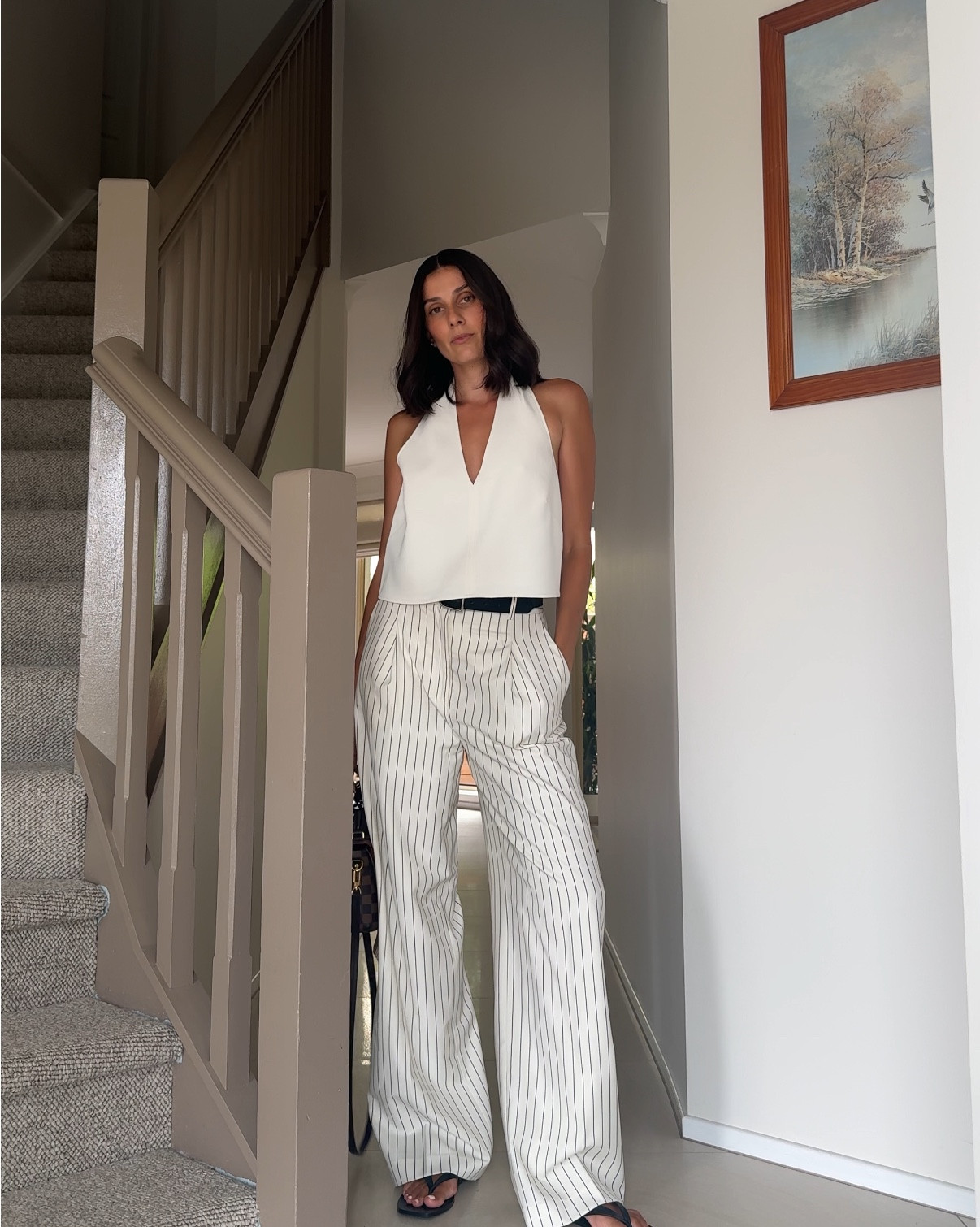 A classic look that can be dressed up or down or layered with the cooler months ahead! Pinstripe pants in crème and a structured white halter top. Paired with a black belt, black sandals, brown sunglasses and a brown bag. Don’t be afraid to mix and match different colours of accessories, especially when your got a simple outfit. Size in both pants and top. 

#LTKaustralia #LTKstyletip #LTKworkwear