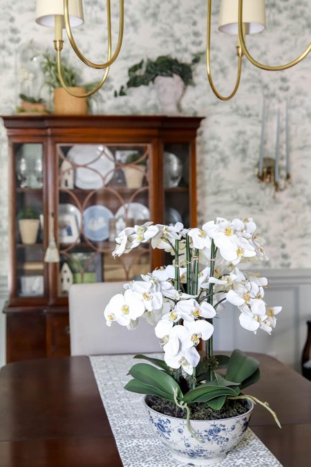 If you’re like me and love real plants, you know it’s still good to have a few faux plants for those areas if your home that don’t have the necessary lighting. I enjoy this faux orchid in my dining room .

#LTKhome