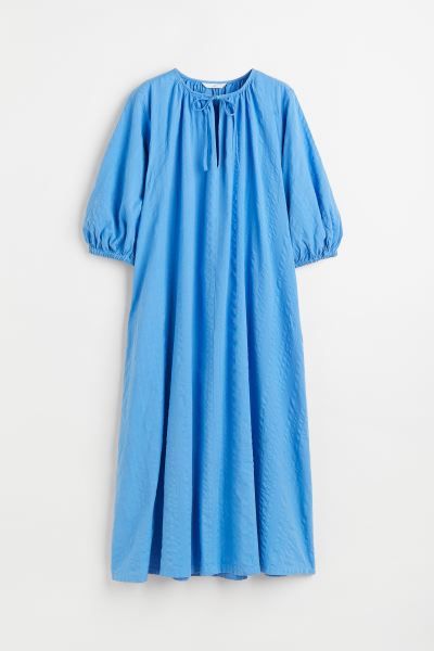 Calf-length dress in woven cotton fabric. V-shaped opening at front with ties at top. 3/4-length ... | H&M (US + CA)