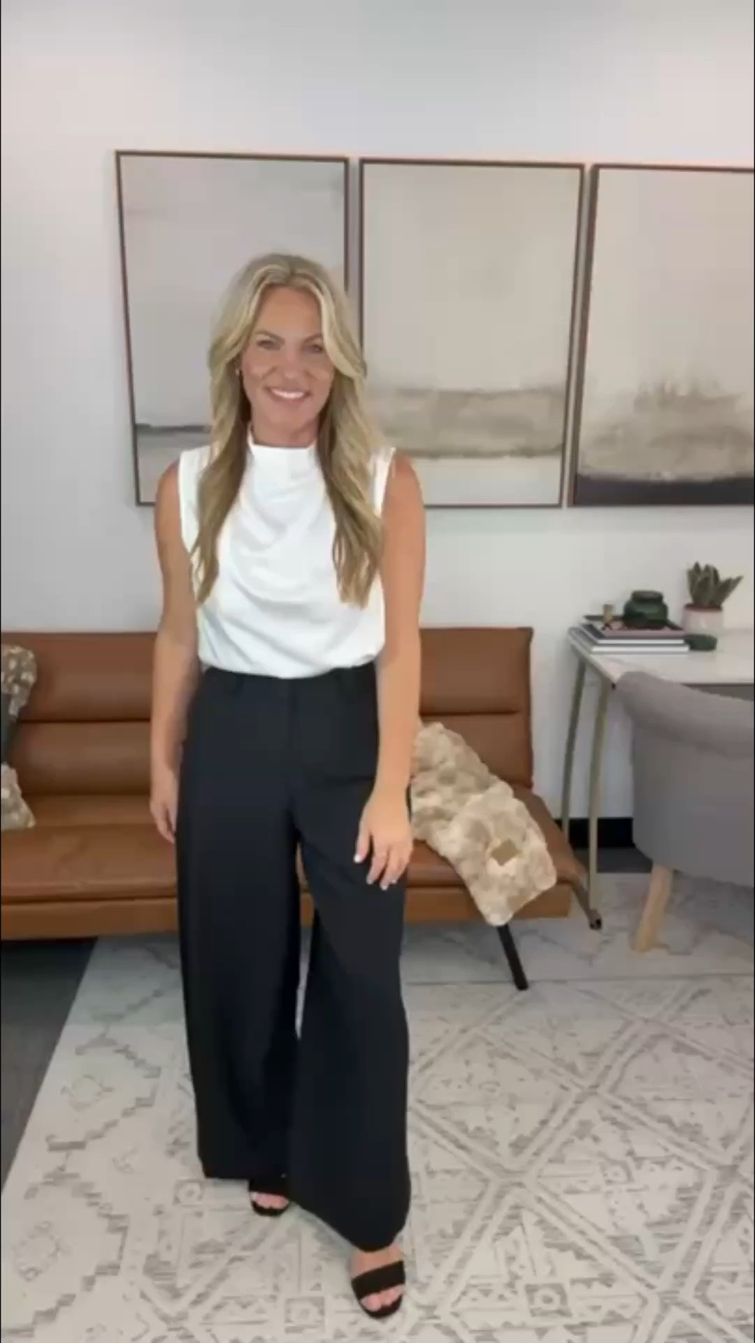This black and white combination is one of those outfits that always looks put together with very little effort. The draped white top adds a soft, elevated touch, and the wide-leg trousers create a timeless silhouette that’s perfect for meetings, presentations, or an evening out after work.

Office outfit, business casual, white draped top, wide leg trousers, workwear inspiration, professional style, office fashion, capsule wardrobe, elevated basics, AudrieDollins

#LTKWorkwear #LTKSeasonal #LTKootd