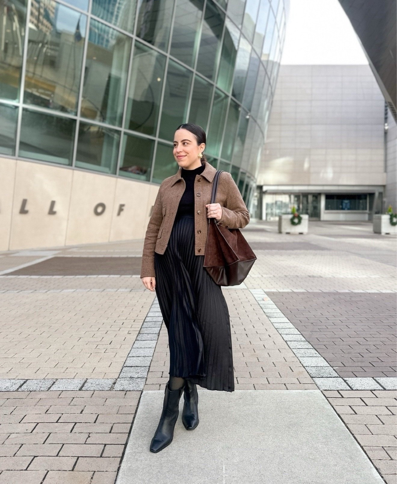 Throwback to this outfit, wearing my trusty elastic waistband skirt with a black turtleneck and warm cropped jacket. It’s all about the details with this beautiful suede bag that really elevates the outfit!

maternity style, timeless fashion, classy look, elegant chic, boots season, suede finds, fall outfit, autumn wardrobe

#LTKU #LTKHoliday #LTKSeasonal