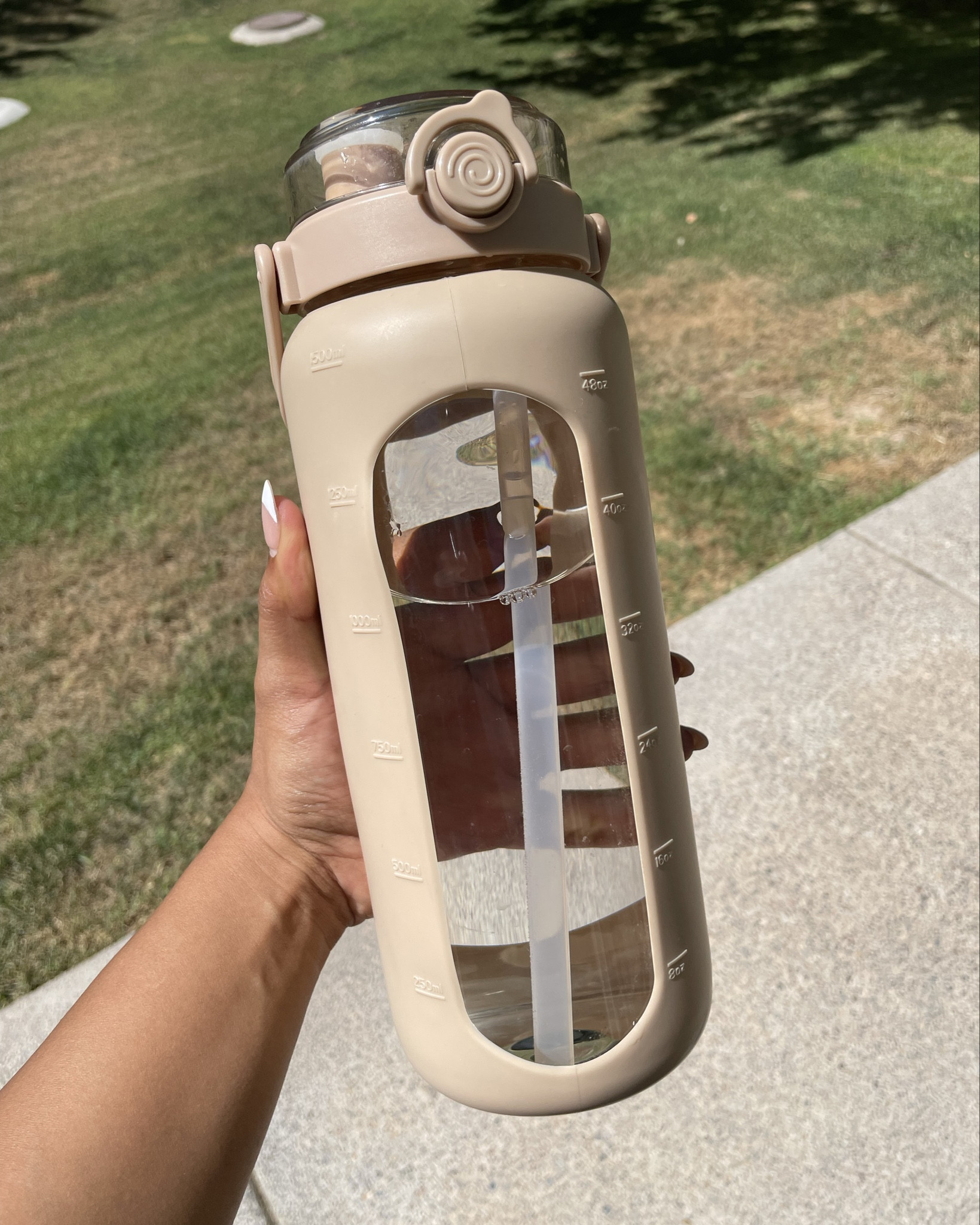 I love a water bottle that keeps me accountable! This one has time stamps indicating how much water you should drink throughout the day, as well as measurements in ounces. I genuinely find myself drinking more water because of it lol. Plus, I'm a fan of neutrals, so this bottle is perfect!

#LTKFitness #LTKActive #LTKTravel