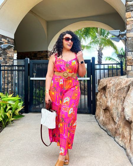 In love with this jumpsuit perfect for travel and it’s now $25. It’s comes in different colors and patterns. Perfect for this Florida weather. #vacationlook #midsizefashion #travel #fashionover40 #curvygirlstyle #jumpsuit 