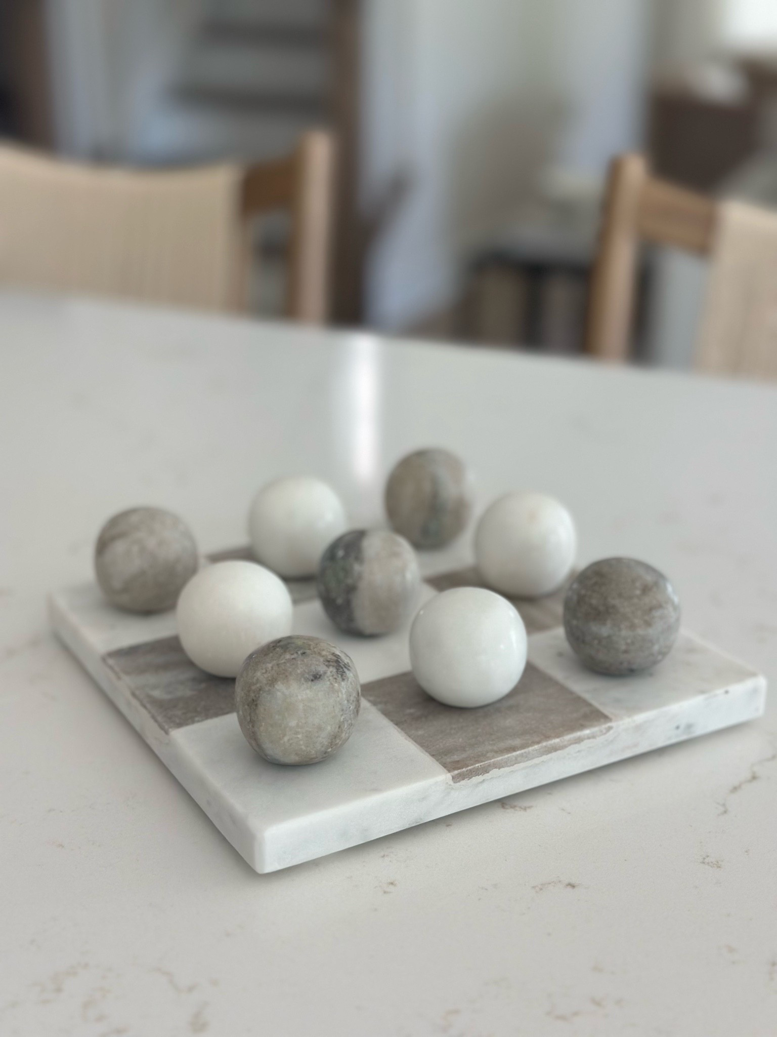 The prettiest marble tic tac toe board. Perfect to style on a coffee table. 

#marbleticttactoeboard #coffeetabledecor #homedecor

#LTKHome