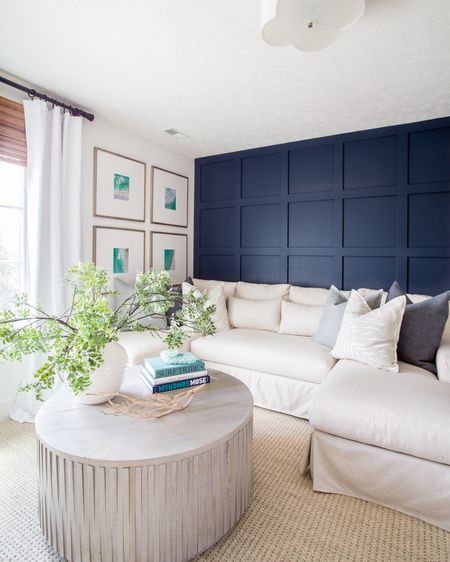 *Coffee table restock alert * Our Omaha updated cozy den with a linen sectional, linen blackout drapes, woven bamboo window coverings, faux greenery, a round wood coffee table styled with coastal decor, an oversized gallery wall, and spring pillows! See more of this space here: https://lifeonvirginiastreet.com/benjamin-moore-hale-navy/.

#ltkhome #ltksalealert #ltkstyletip #ltkseasonal #ltkfamily #ltkfindsunder50 #ltkfindsunder100

#LTKhome #LTKsalealert 

#LTKSaleAlert #LTKHome #LTKSeasonal