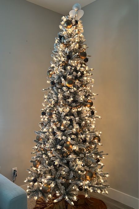Finally got my Christmas tree up! 🤣 
This is the 9ft but it’s sold out :( I linked a different 9ft that isn’t flocked.

I rub and buffed the large ornaments to make them this color. 

Organic modern Christmas decor, Luxe organic, gold ornaments, diy ornaments, minimalist Christmas, modern Christmas, chocolate and gold Christmas 

#christmasdecor #christmastree #organicmodern #amazonhome #founditonamazon 

#LTKSeasonal #LTKhome #LTKHoliday