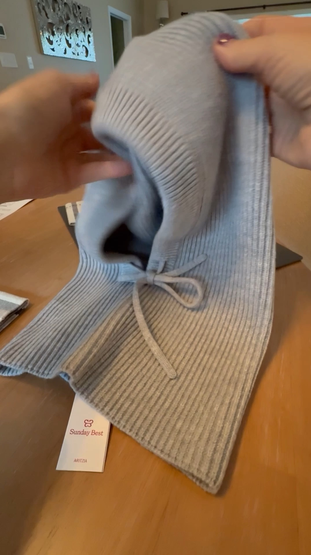 ribbed hood with self-tie drawcords for a custom fit. It’s knit from soft and cozy yarn.  So soft and stretchy I’m excited to use this on my winter walks!!  Will keep my head, ears and neck warm, better than a beanie and scarf.  From Aritzia.  Sold out but tagged similar 