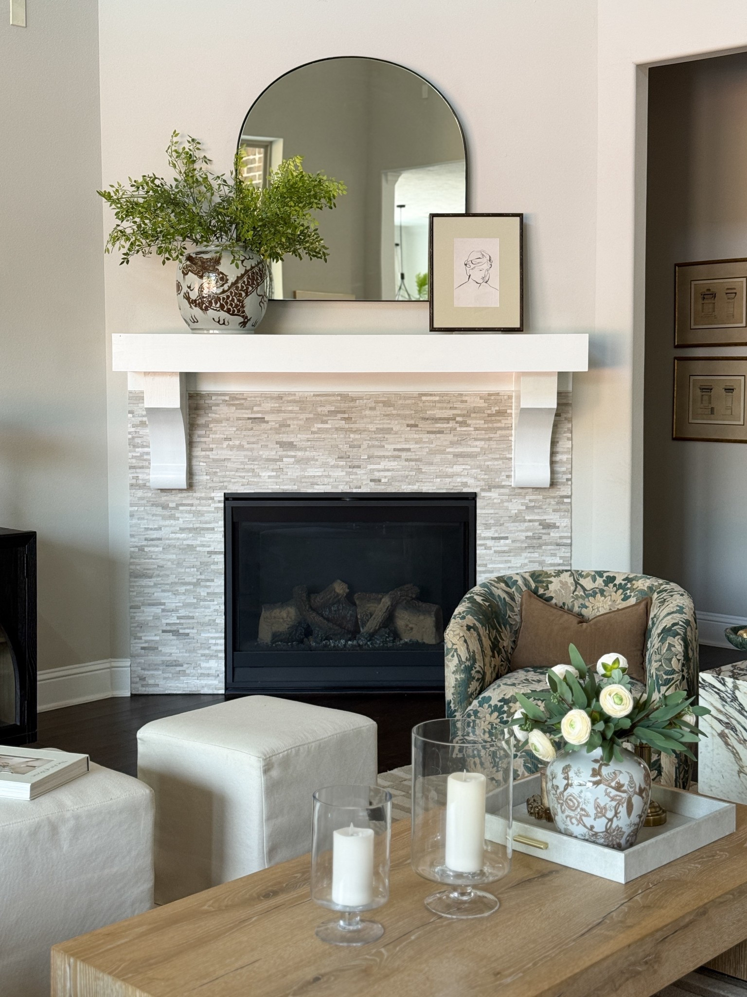 A small mantel update but it made the biggest difference 🤍 I was craving something a little fresher and lighter, and this mix of an arched mirror, layered art, and a ginger jar with realistic greenery feels simple but elevated. Still tweaking, but this look is really close to what I had in mind.


fireplace mantel styling, mantel decor ideas, arched mirror decor, layered art styling, ginger jar decor, classic home styling, timeless home decor, transitional style, living room styling ideas, fireplace refresh, Amazon greenery stems, realistic faux greenery, Alice Lane decor, neutral layered styling, shelf styling ideas, elevated home decor, simple mantel styling, cozy living room details

#LTKHome #LTKSeasonal