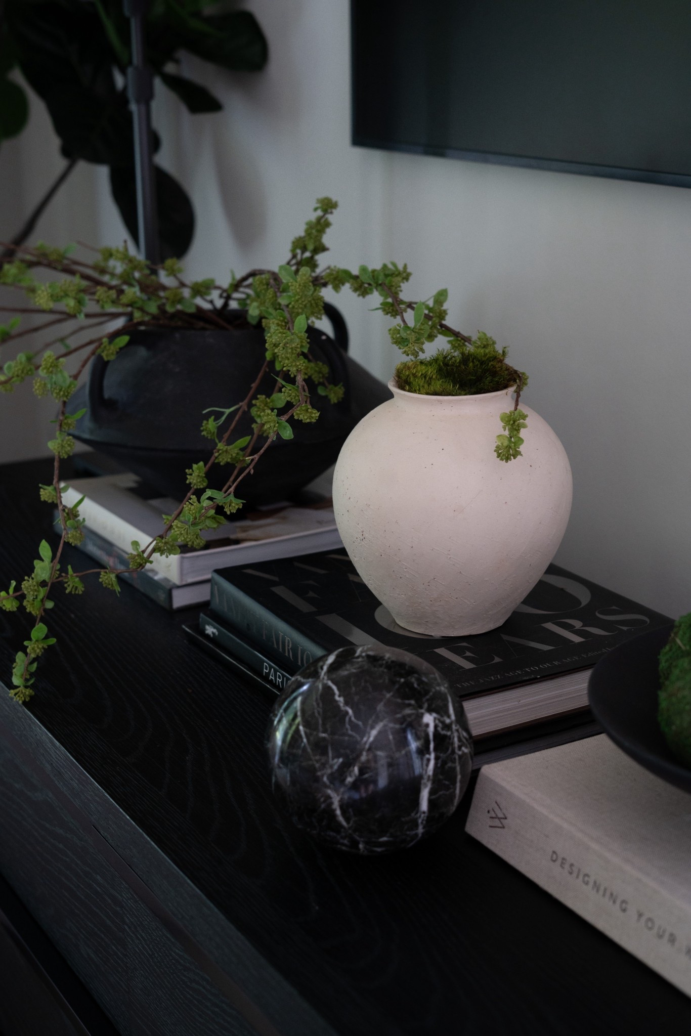 Welcome to my summer bedroom refresh! I wanted this space to feel calm, luxurious, and effortlessly modern, and I’m obsessed with how it turned out. I layered crisp white bedding with black accents for that high-contrast, timeless look I always love in interior design. The black chandelier and matching curtain panels add a dramatic touch, while soft textures like the throw blanket and neutral ottoman keep everything cozy and inviting. A mix of modern art, sculptural decor, and stacked coffee table books gives this room that curated, designer feel without being overdone. If you're looking for bedroom decor ideas or want to create a moody yet minimal space that still feels fresh for summer, this look is proof that black and white is always in style.


#LTKHome #LTKSeasonal #LTKSummerEdit