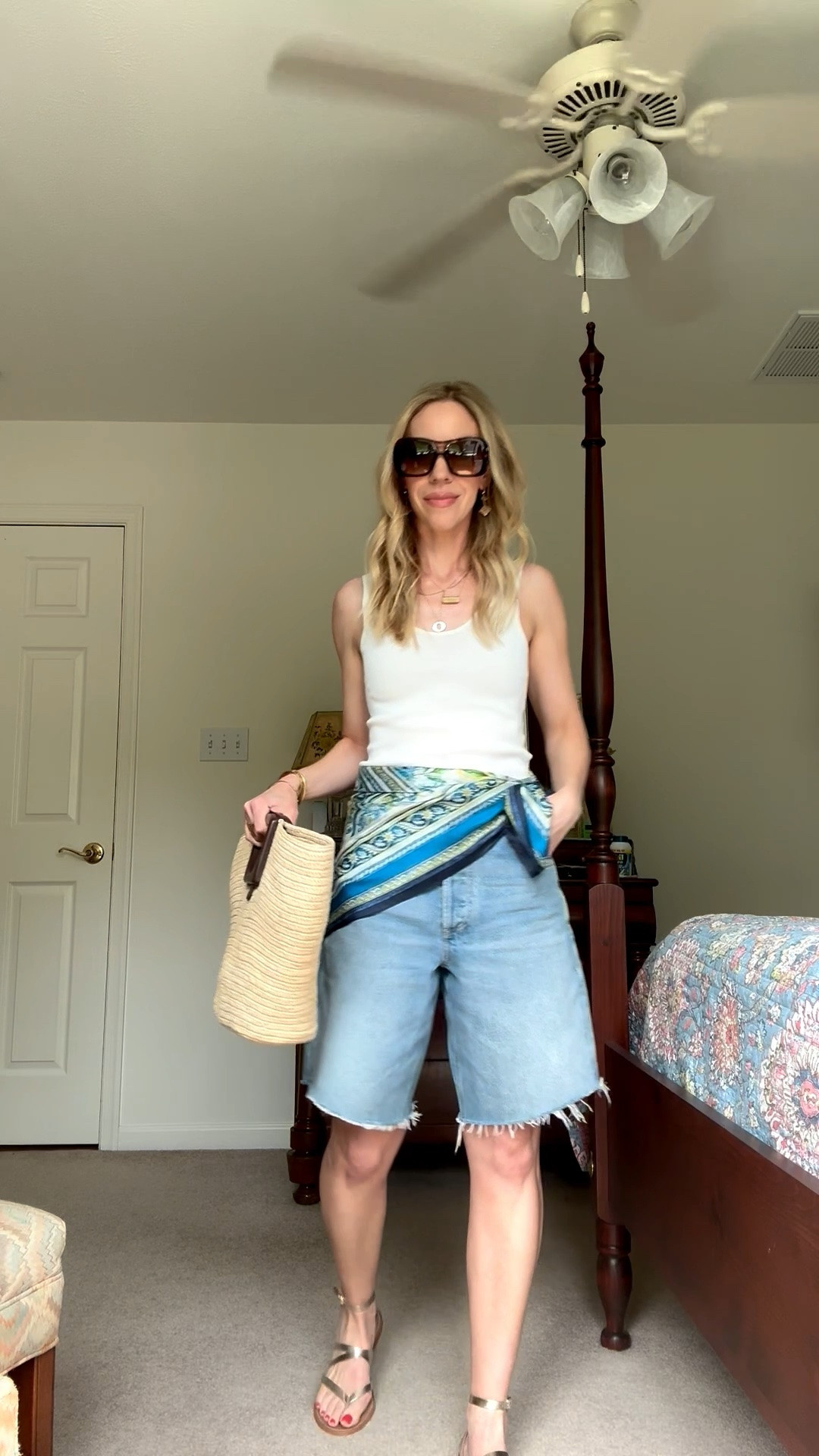 White tank and denim shorts, vacation look, denim bermuda shorts, satin scarf tied at waist, Le Tanneur straw tote bag

#LTKTravel #LTKOver40 #LTKSeasonal
