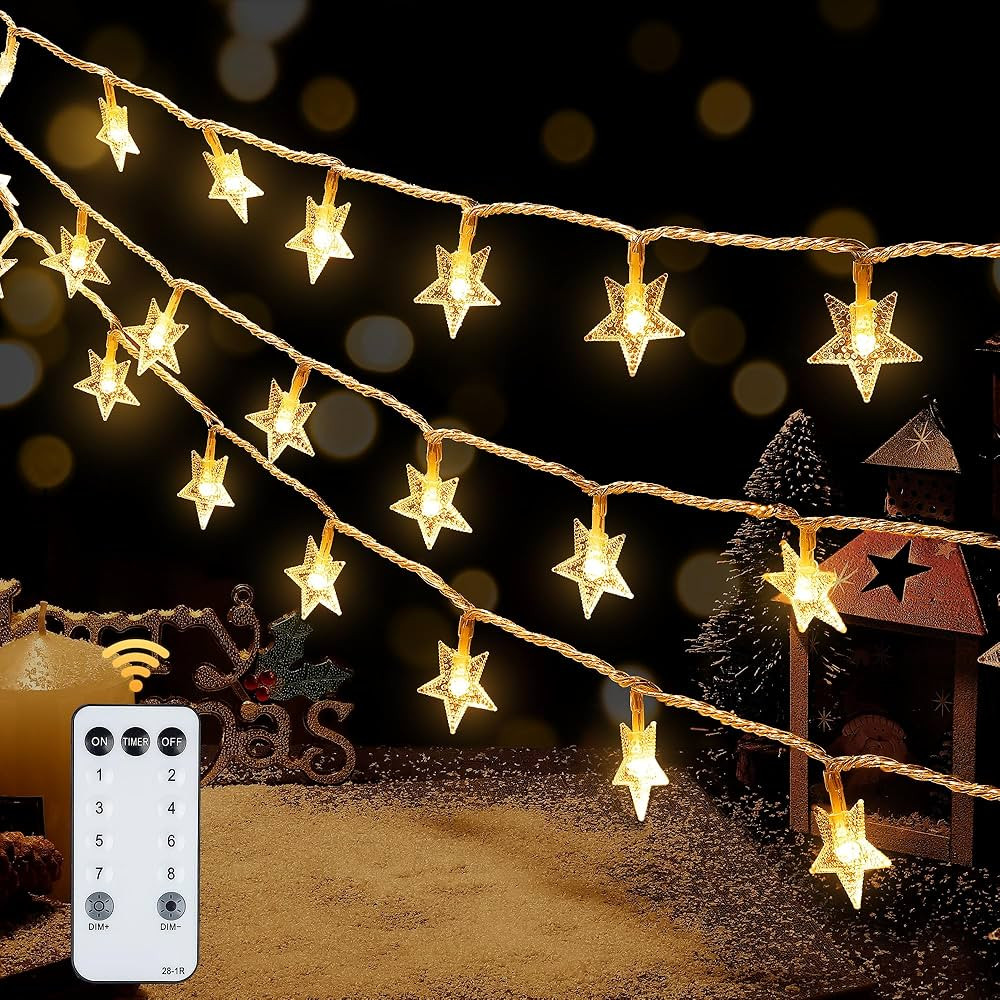 HEYFUNi Warm White Star String Lights,39FT 100LED Plug in Fairy Twinkle Lights with 8 Modes Water... | Amazon (US)