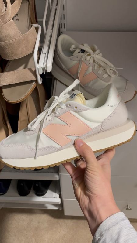 Cute neutral sneakers with a pop of pink that makes them perfect for spring outfits!

I got the size I normally get for sneakers and they fit great!

#LTKunder100 #LTKFind #LTKshoecrush