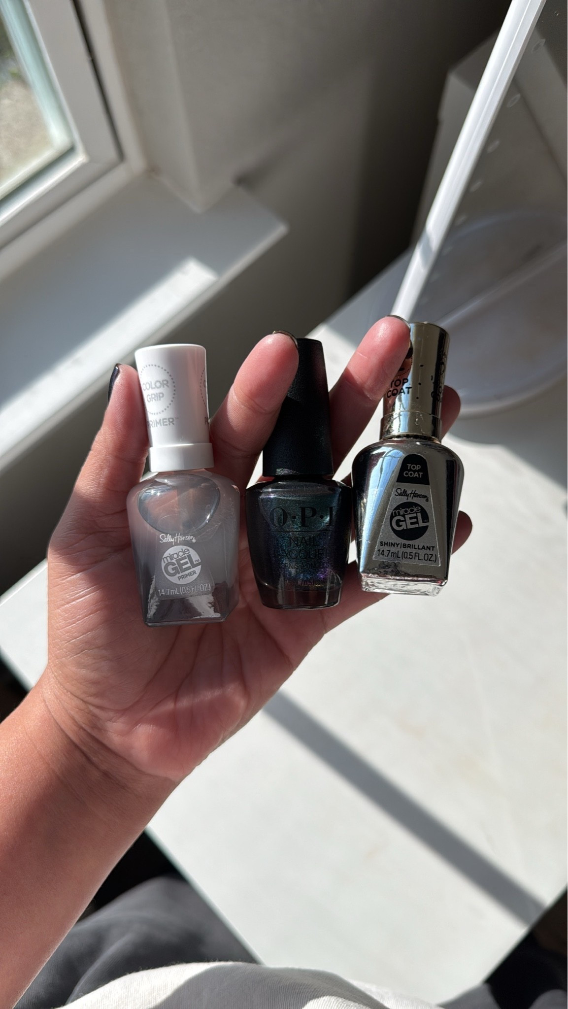 Favorite base coat and top coat to help make your polish last longer. Also love this nail shade!! It’s a sparkly emerald.
