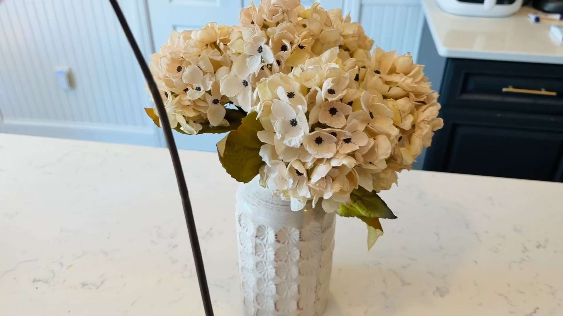 #ad This post contains affiliate links, which means I may earn a small commission if you make a purchase through my links.

These artificial silk hydrangeas are an easy way to bring a soft fall touch into your home without the maintenance of fresh flowers. The cream white tone works beautifully with neutral decor, and the dried-look finish adds subtle texture for autumn styling. Perfect for vases, centerpieces, or seasonal office decor. 

 #LTKHome