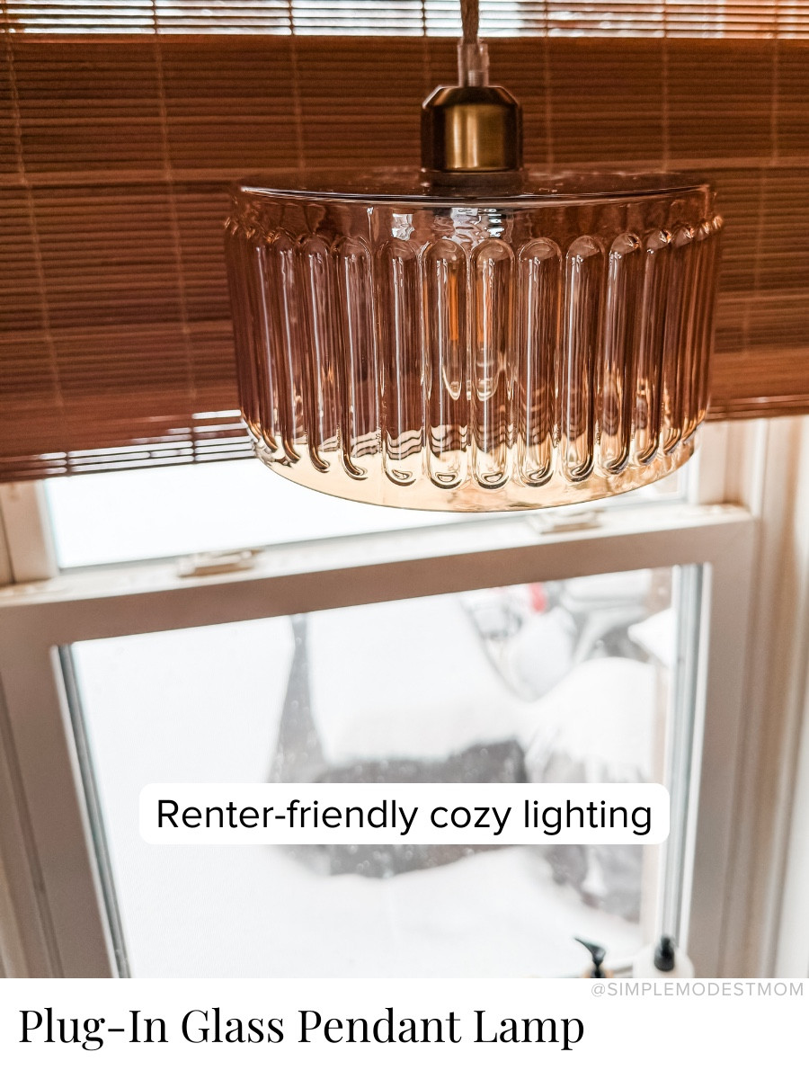 I needed a renter-friendly option for better lighting over our kitchen sink and landed on this beautiful amber-colored glass pendant light that just plugs into any outlet. It is also dimmable, which I love for the cozy vibes in the evening. This listing also included an edison bulb for the lamp.

#LTKdayinmylife #LTKHome