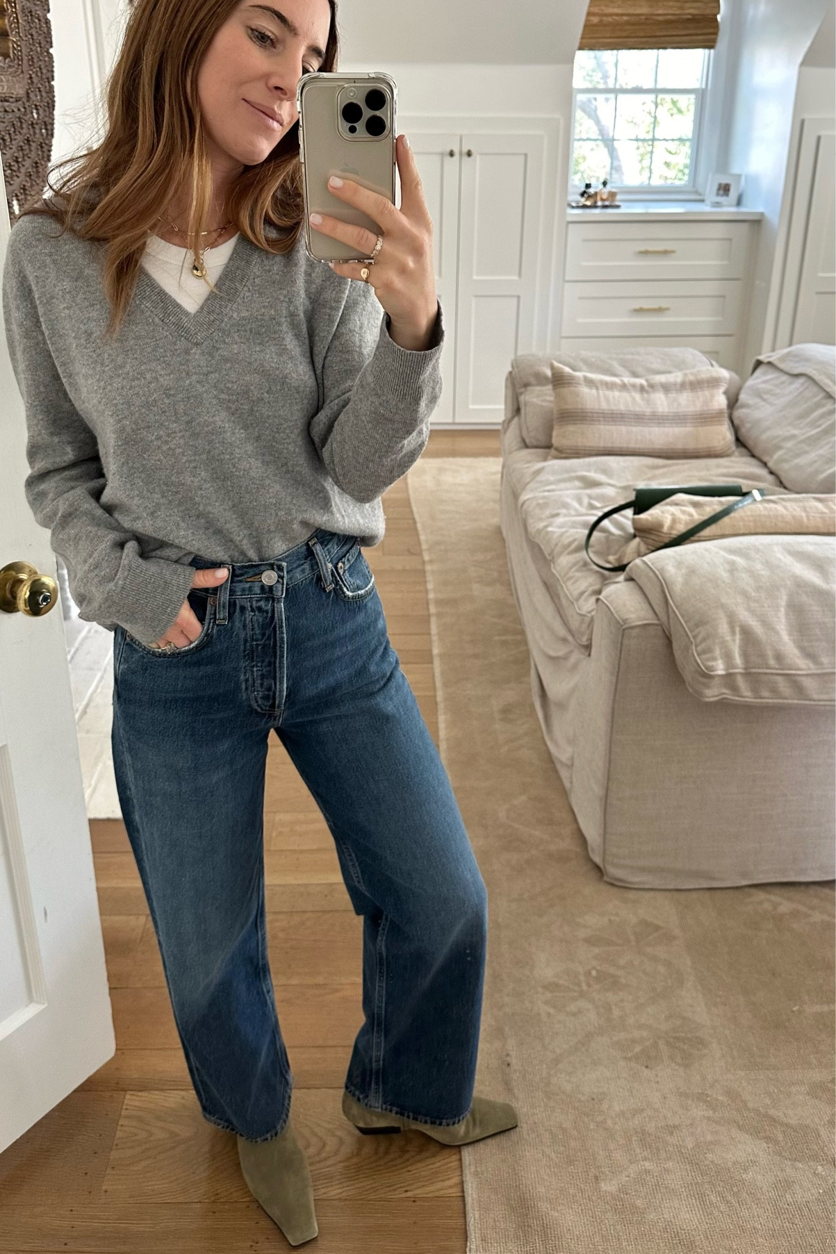 A great slightly wide leg cropped denim (hits longer on me since I’m 5’1”) but I’ve had the Ren for years and recently rebought in the darker wash for a clean blue denim. 

And the sweater is the Flynn from Jenni Kayne (my code is: ALICIA15) 
It’s probably my most worn / such a go-to classic and I wear the XS. 

#LTKSeasonal