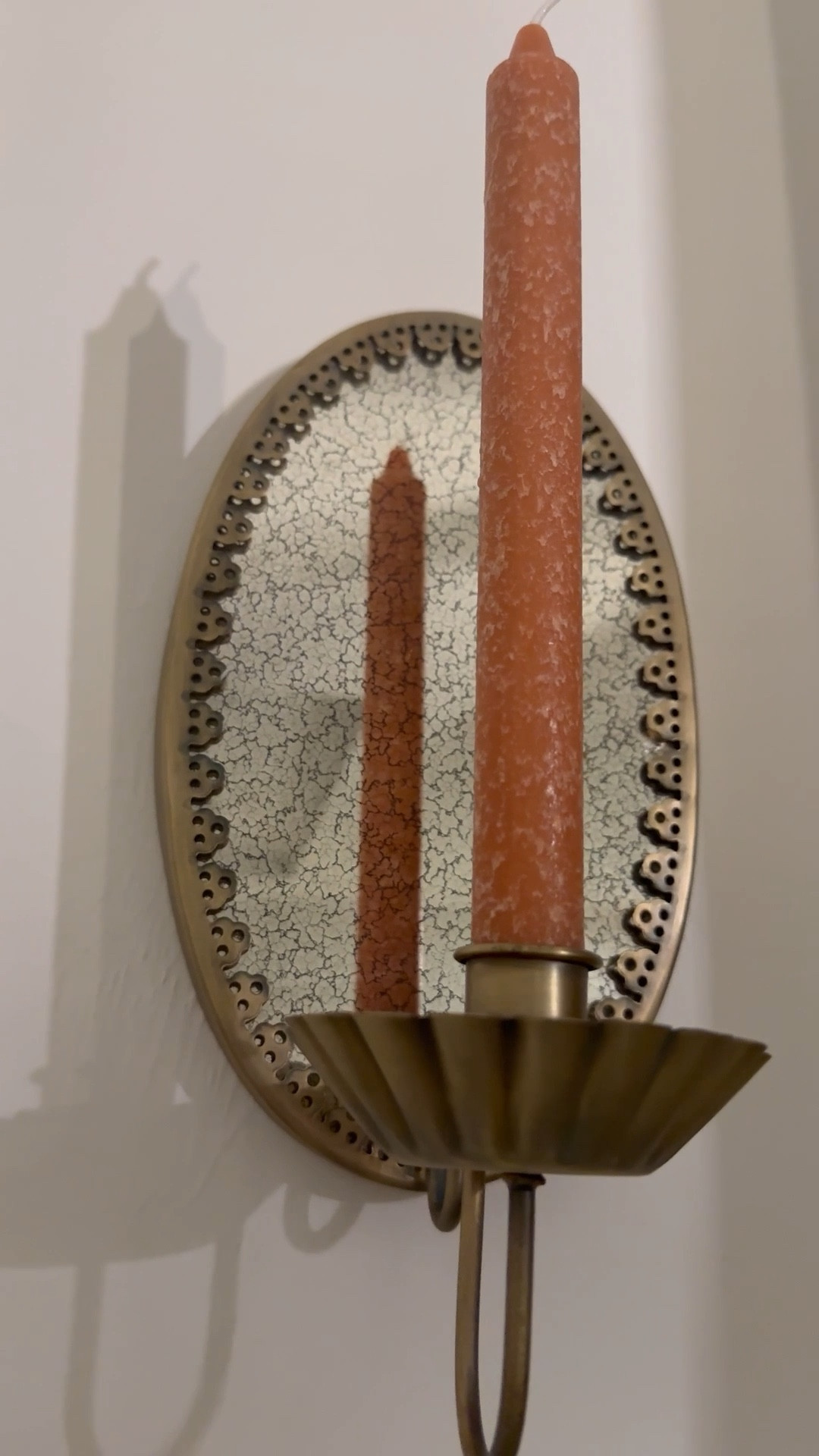 A little candlelight goes a long way ✨ 
I added this brass wall sconce to bring a warm, cozy glow and it feels so timeless. 
The scalloped edge and the antiqued mirror backing give it that soft cottage charm I love 🤍

Linked here for you ✨

#LTKHome #LTKGiftGuide #LTKU