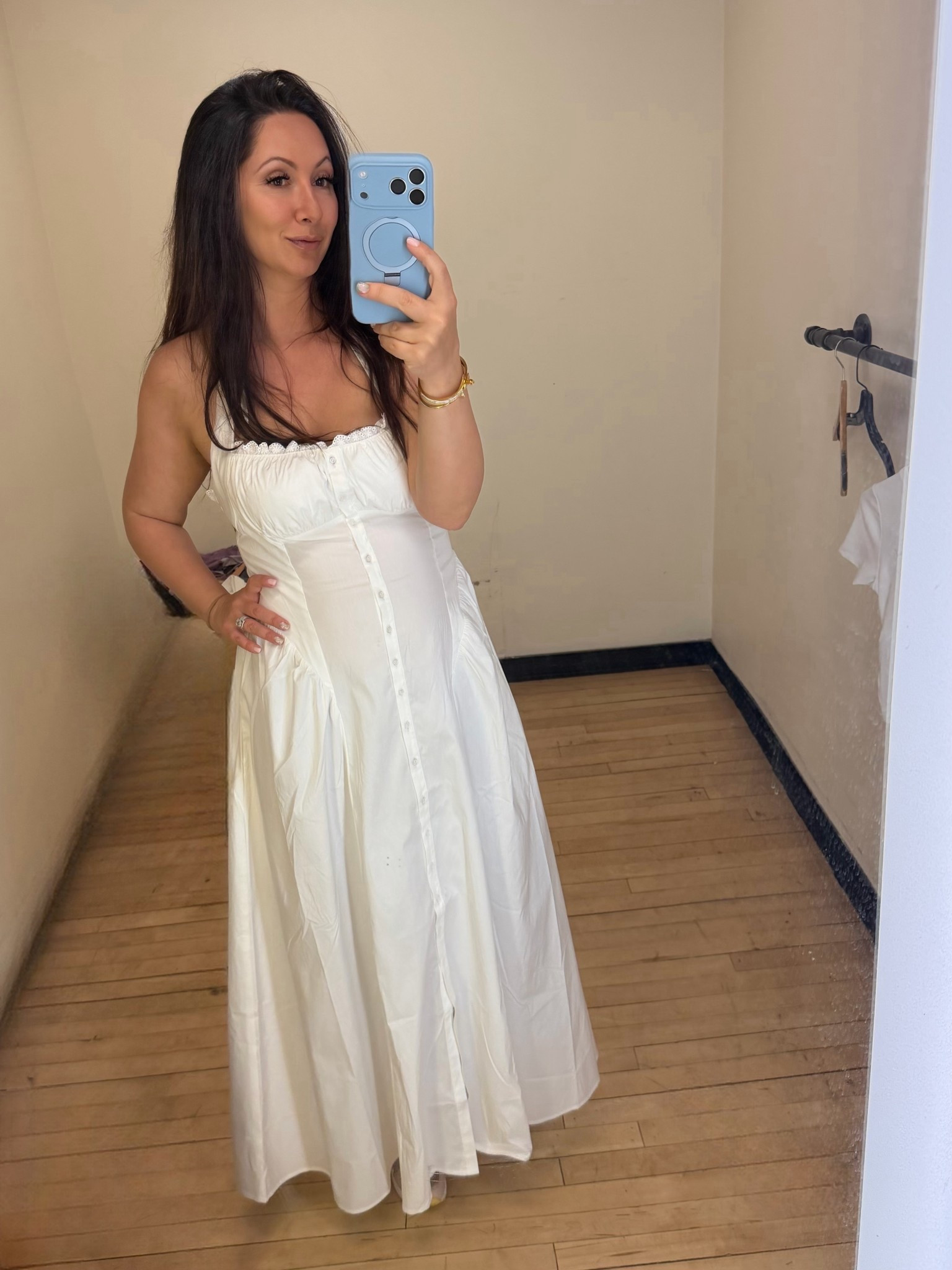 This dress is giving effortless summer energy and I’m obsessed. 🤍 Found this dreamy white midi at Urban Outfitters and it’s one of those pieces that instantly makes you feel put together with zero effort. The fit is super flattering through the waist, the button details make it feel elevated, and the lightweight fabric is perfect for warm days.

It’s the kind of dress you can wear to brunch, vacation walks, baby showers, date night or even just running errands but still looking chic. I styled it simple but it would also look adorable with a straw bag and sandals or dressed up with heels.

If you love feminine pieces that feel easy but look expensive, this one is so good.

Shop it in my LTK before it sells out.

#LTKStyle #LTKFinds #LTKSeasonal #SummerStyle #FeminineStyle #EffortlessStyle #UrbanOutfitters #MidiDress

#LTKOver40 #LTKMidsize #LTKdayinmylife
