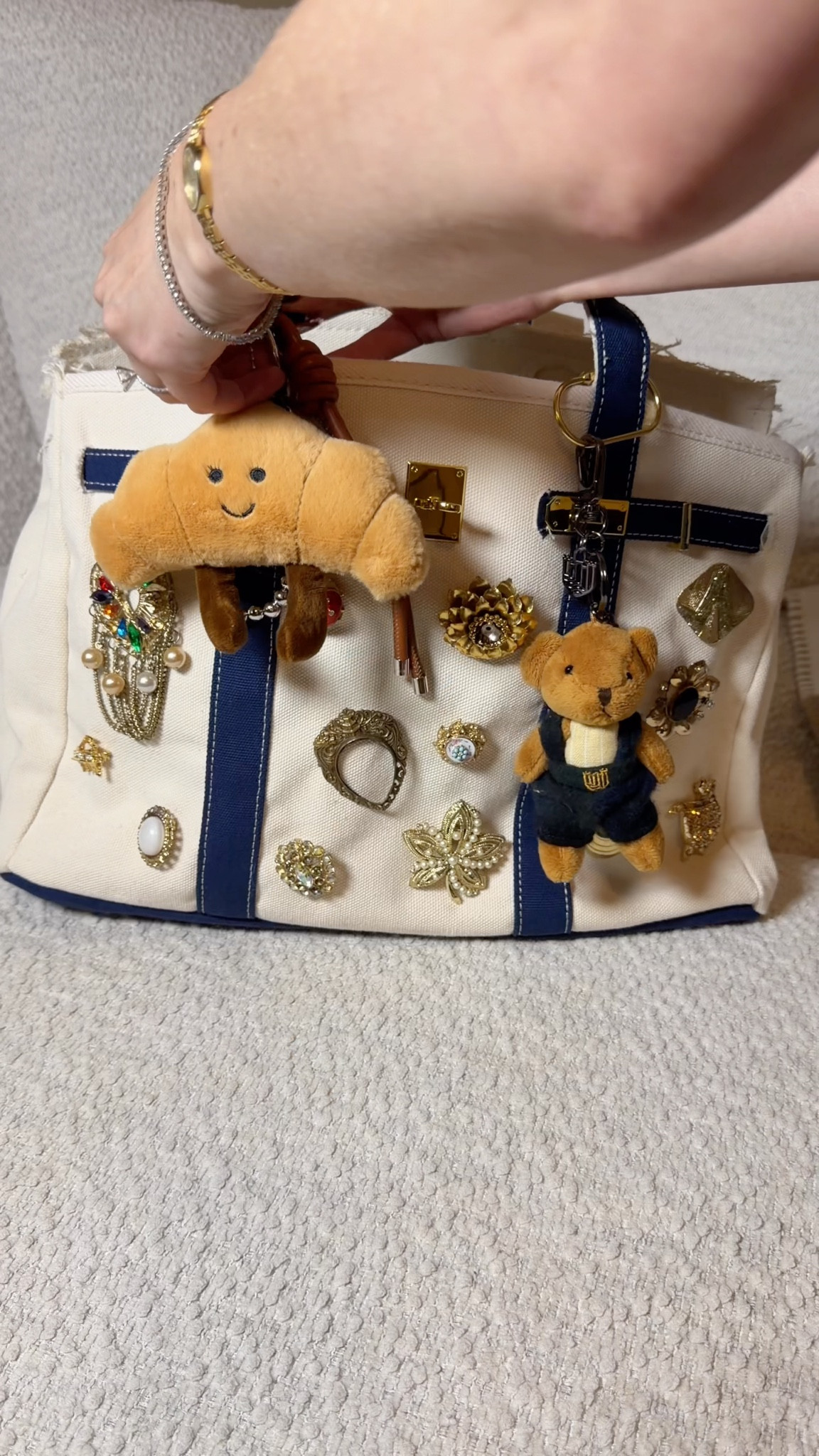 This is your sign to customize your boatkin (or any tote) with vintage brooches ✨ I had so much fun arranging the brooches on this bag! I got a brooch and broken jewelry lot on eBay to do this


#LTKItBag #LTKStyleTip