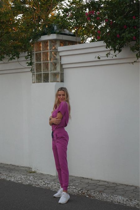 New FIGS color launch! 

Wearing the color Fuchsia 
Top: Catarina one pocket scrub top XS (linked) 
Bottoms: High waisted Zamora joggers XS (linked) 
Shoes: Adidas (linked) 
Accessories linked! 

Use my code: AMYBFIRSTFIGS for $$ off the Wearfigs website 

Use my code: ABRUTSKY15 for $$ off the MVMT watch website 

#LTKworkwear #LTKSeasonal #LTKHoliday