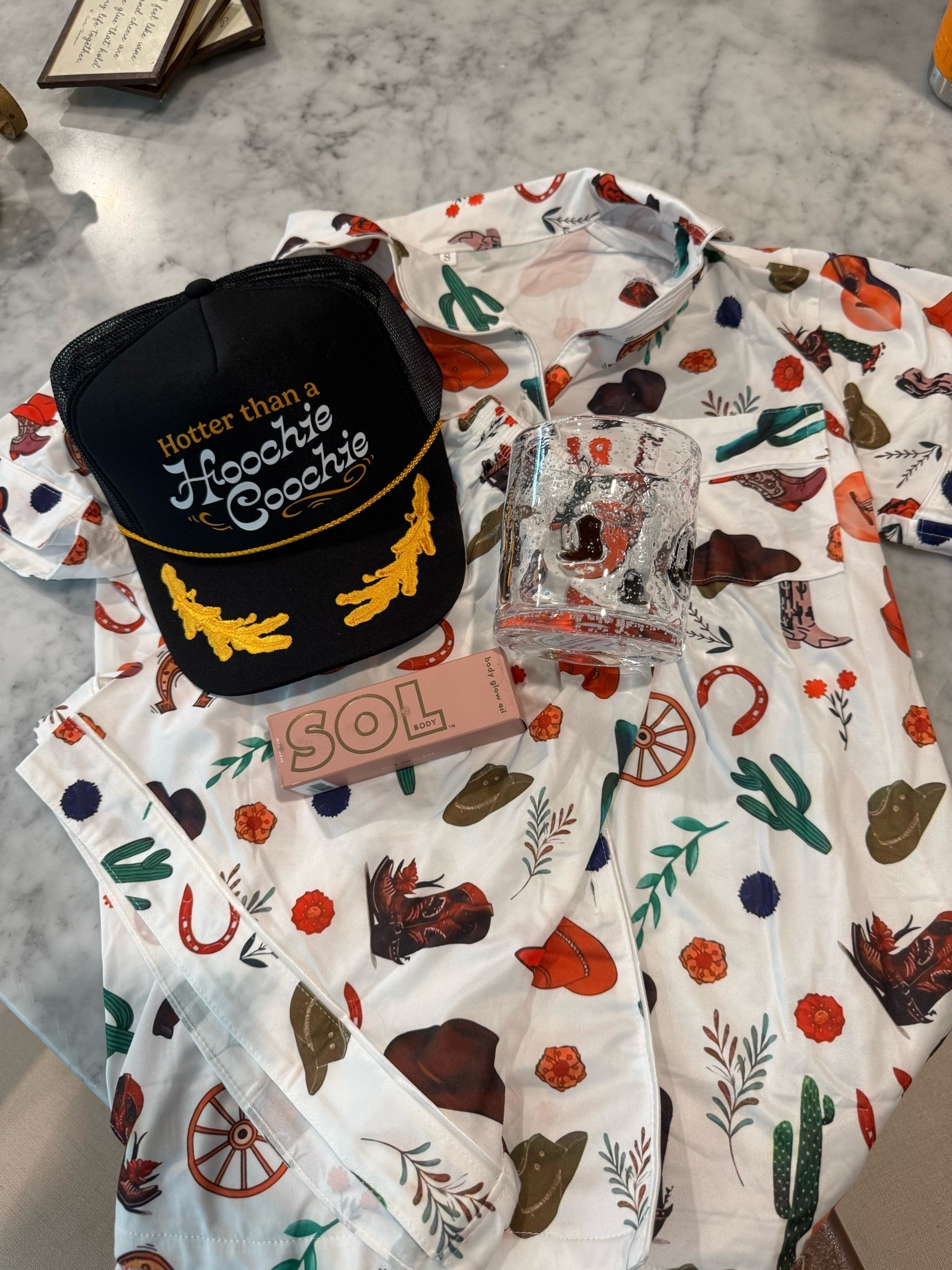 You know I love a good gift bag. 🤠✨

Putting together the cutest little welcome bags for our girls’ trip to Nashville! Filled them with the sweetest cowboy print pajamas, the cutest cowboy boot glasses, my favorite body shimmer for that glowy skin, and of course… a fun trucker hat.

#GirlsTrip #NashvilleGirlsTrip #NashvilleBound #CowgirlStyle #WesternInspired #GiftBagIdeas #GirlsWeekend #TravelEssentials #CowgirlAesthetic #VacationReady #LTKFinds #LTKStyle #AmazonFinds #WesternFashion #HostessGift #TravelInStyle #BodyShimmer #MatchingPJs #CowgirlVibes #NashvilleOutfits