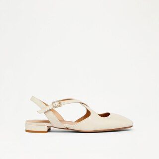 THEATRE Cross Strap Flat in White Nappa | Russell & Bromley | Russell & Bromley