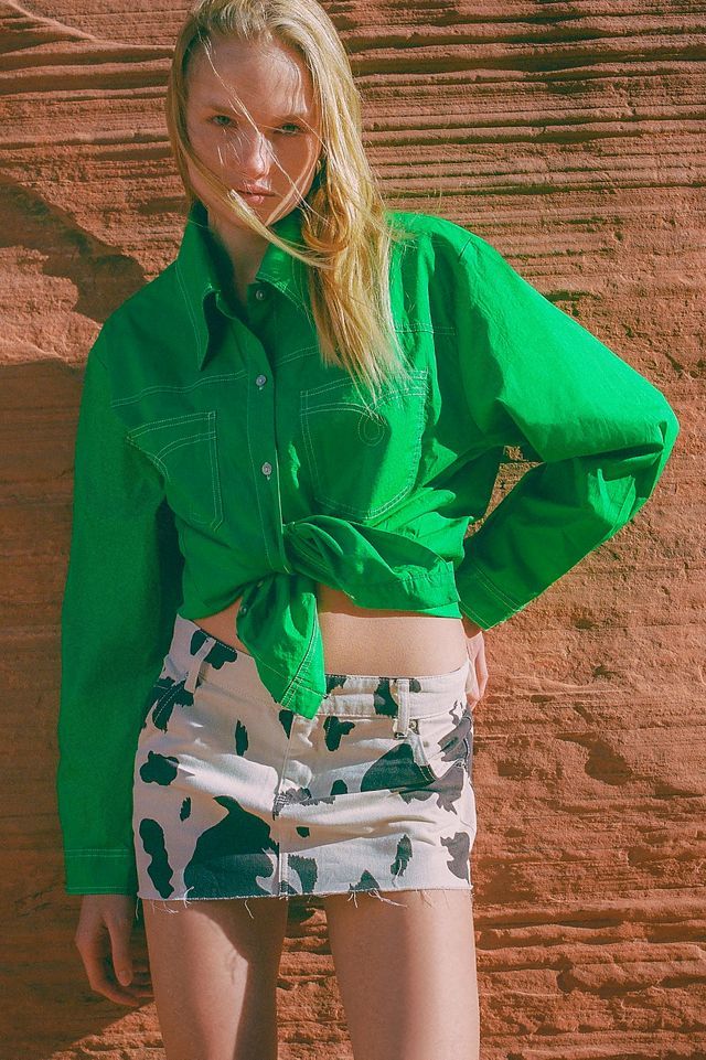 UO Cow Print Denim Mini Skirt | Urban Outfitters (US and RoW)