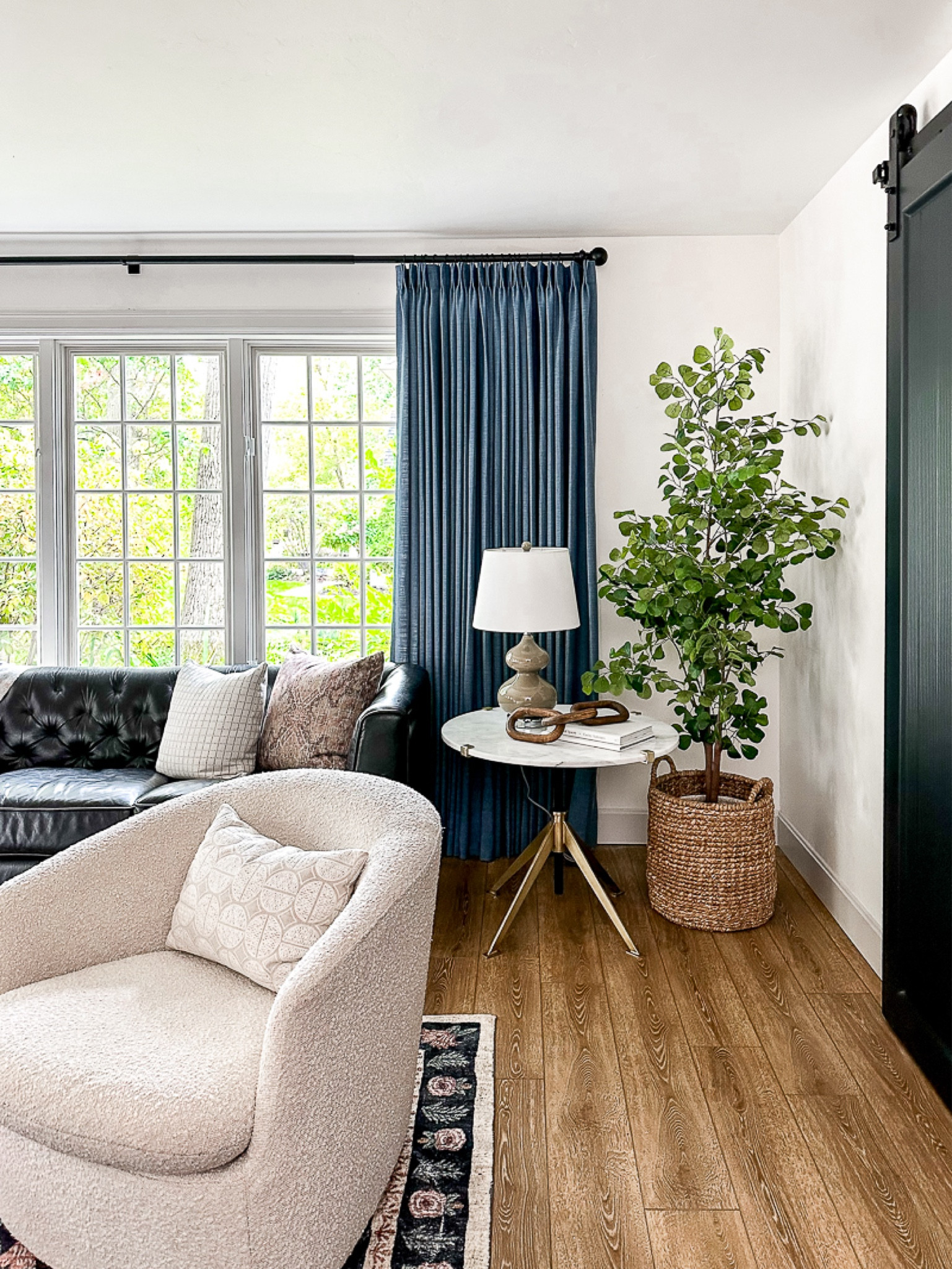 Shop my basement lounge room seasonal makeover! 
Lounge room, swivel chair, faux tree, basket, amazon, lamp, neutral, fall decor, tonic living, loloi, two pages

#LTKfindsunder100 #LTKstyletip #LTKhome