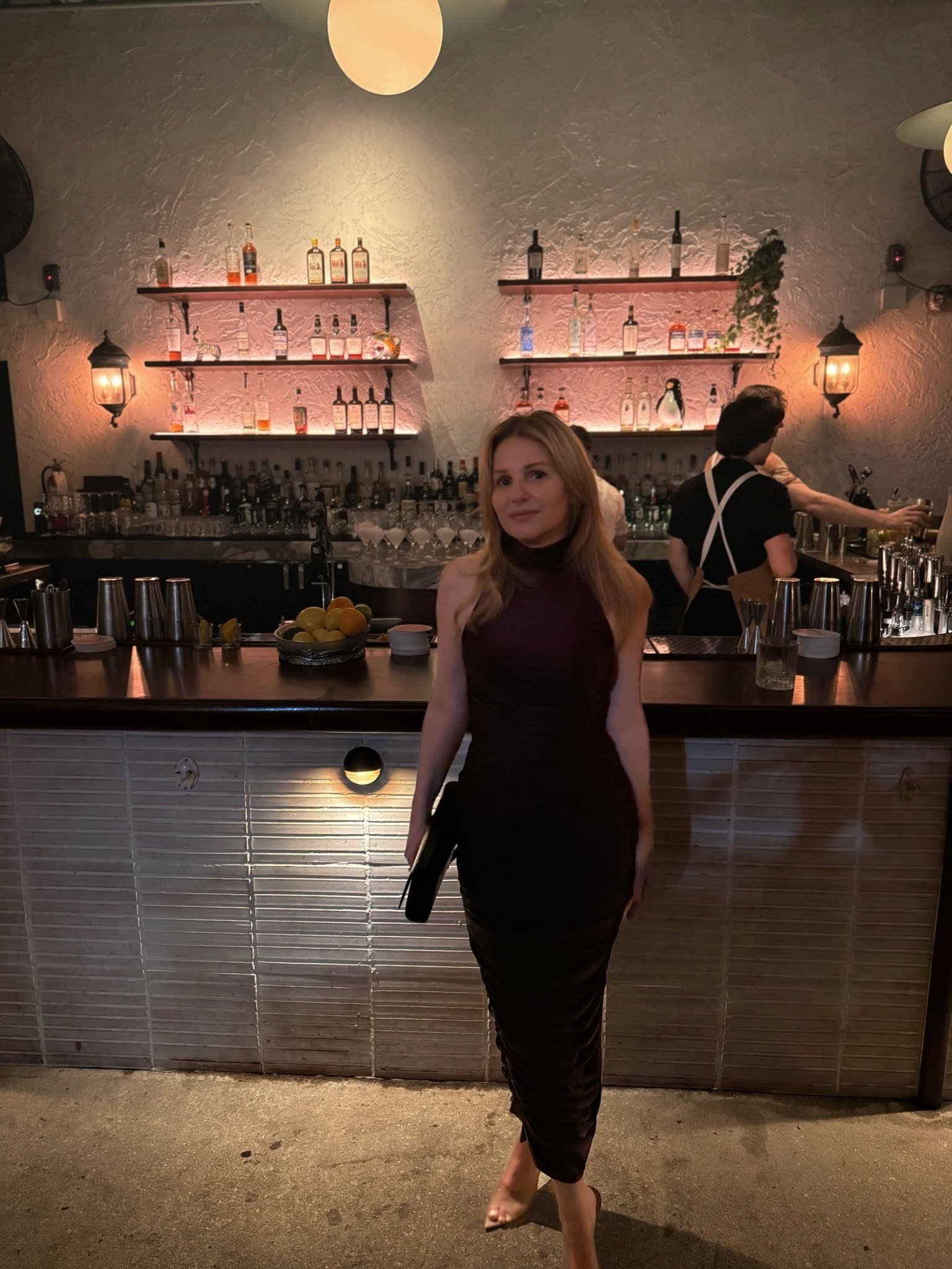 Good transitional dress going into fall, at least until it gets much cooler. It’s a brown mock neck sleeveless long midi ruched dress from @AFRM that I’m wearing w heeled mules from Black Suede Studio. Date night outfit 🤎

#LTKootd #LTKSeasonal #LTKOver40