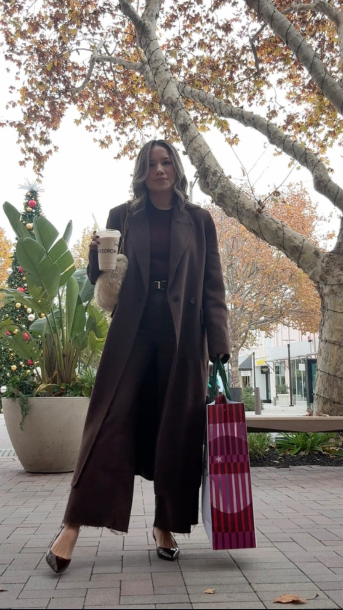 Chocolate brown & burgundy OOTD. Wearing my new found burgundy cashmere tee for under $50. Chocolate wide leg jeans, under $80. Long wool coat. And these burgundy kitten heel pumps are a must-have, so cute and comfy. I get compliments every time i wear them out. And they’re only $60. YSL shearling bag again. 

#LTKSeasonal #LTKootd #LTKmomlife