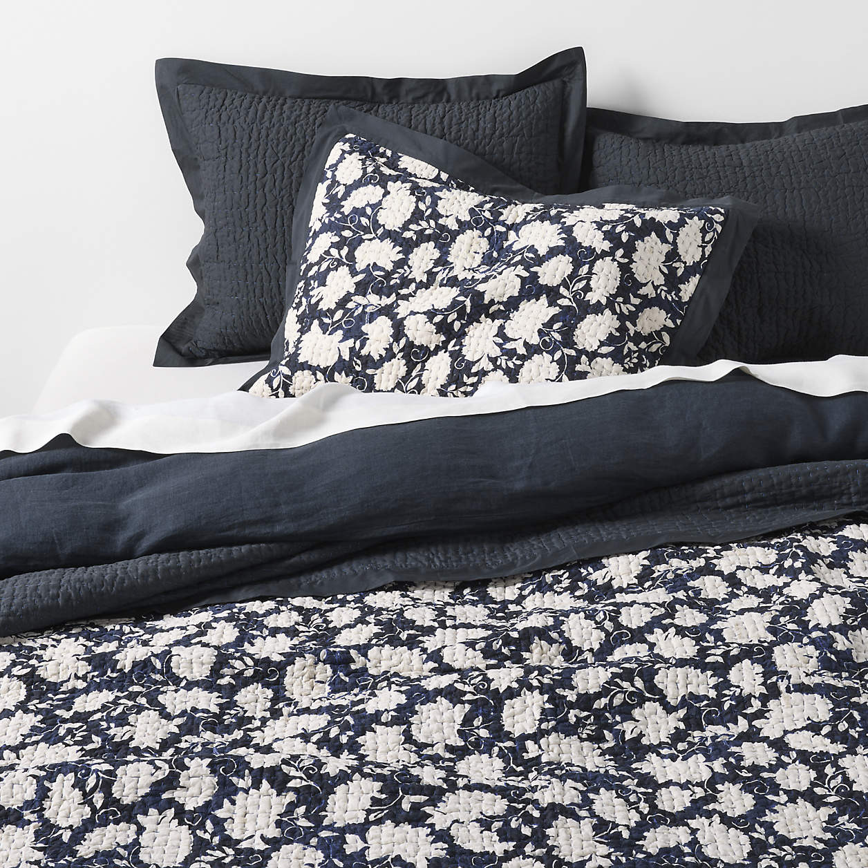 Celeste Organic Cotton Midnight Navy Blue Floral King Quilt + Reviews | Crate & Barrel | Crate & Barrel