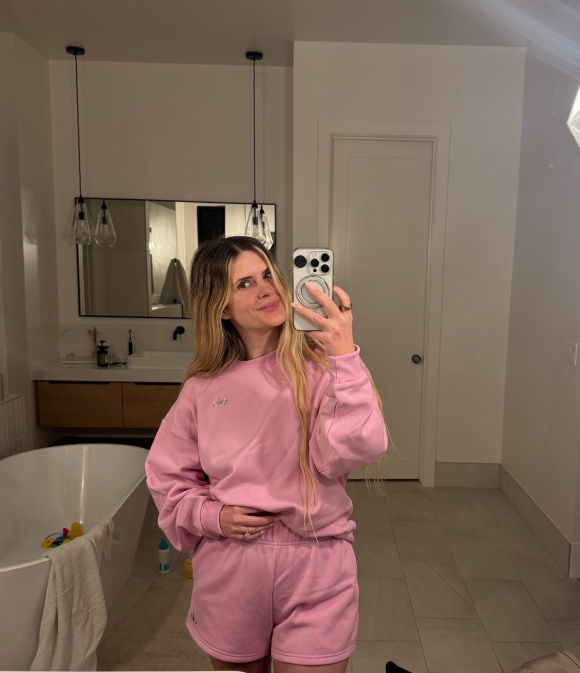 cozy pink alo sweatset. love the shorts! sweatshirt is tts but i sized down 2 sizes in the shorts (got a small sweatshirt and xxs shorts) 🩷

#LTKselfcare #LTKActive #LTKValentine