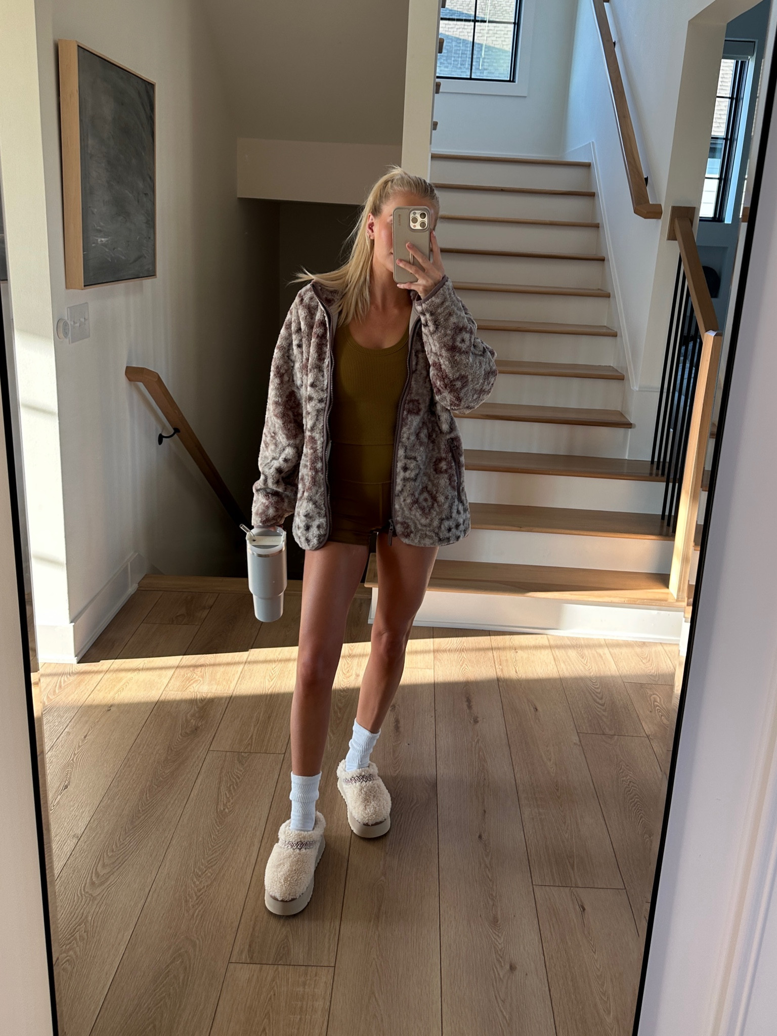 Med in jacket (it’s cort’s)… code AFLTK.  Small in shorts med in tank. Went down to next whole size in Ugg. I’m a 1/2 size 